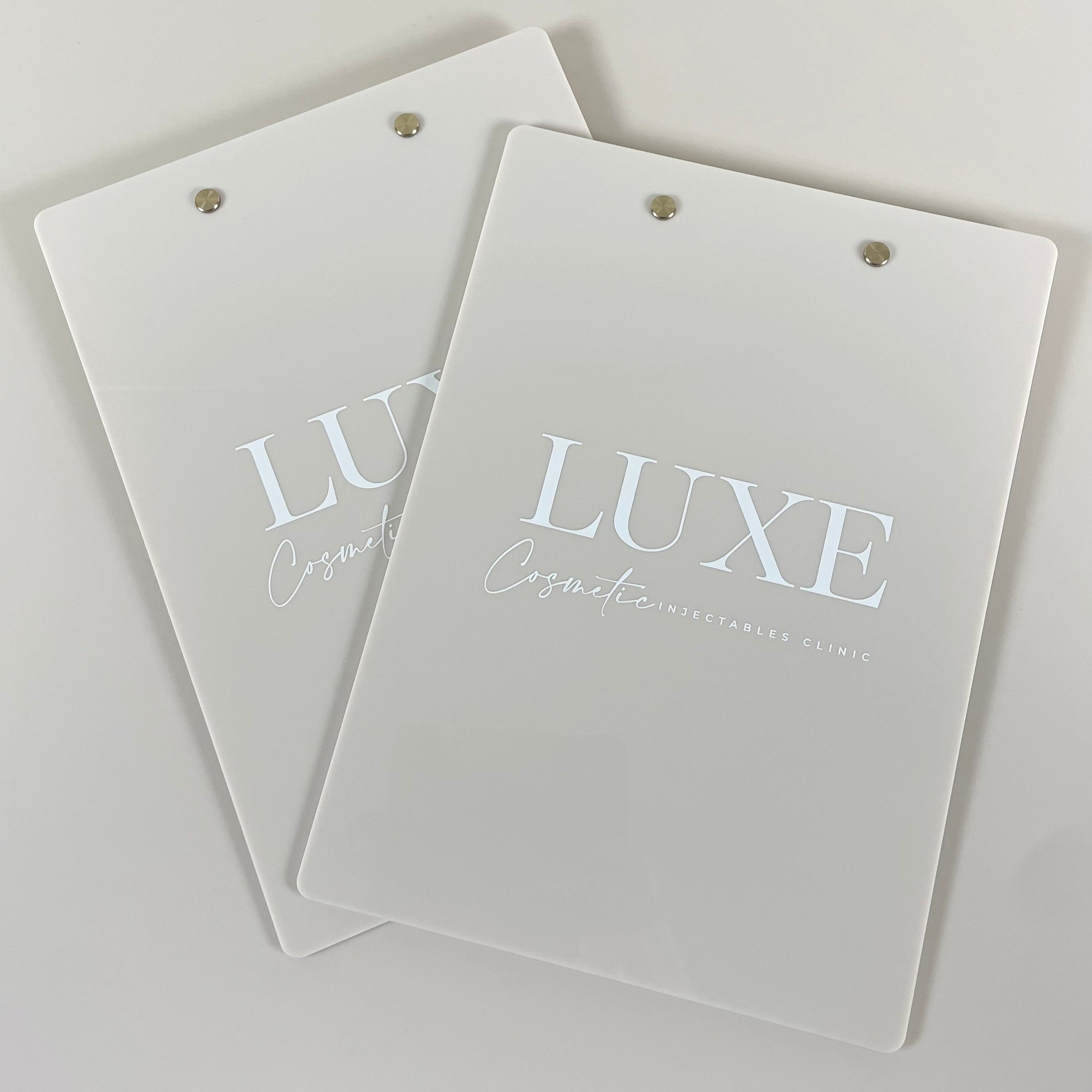 Collection of personalised acrylic clipboards with various logos