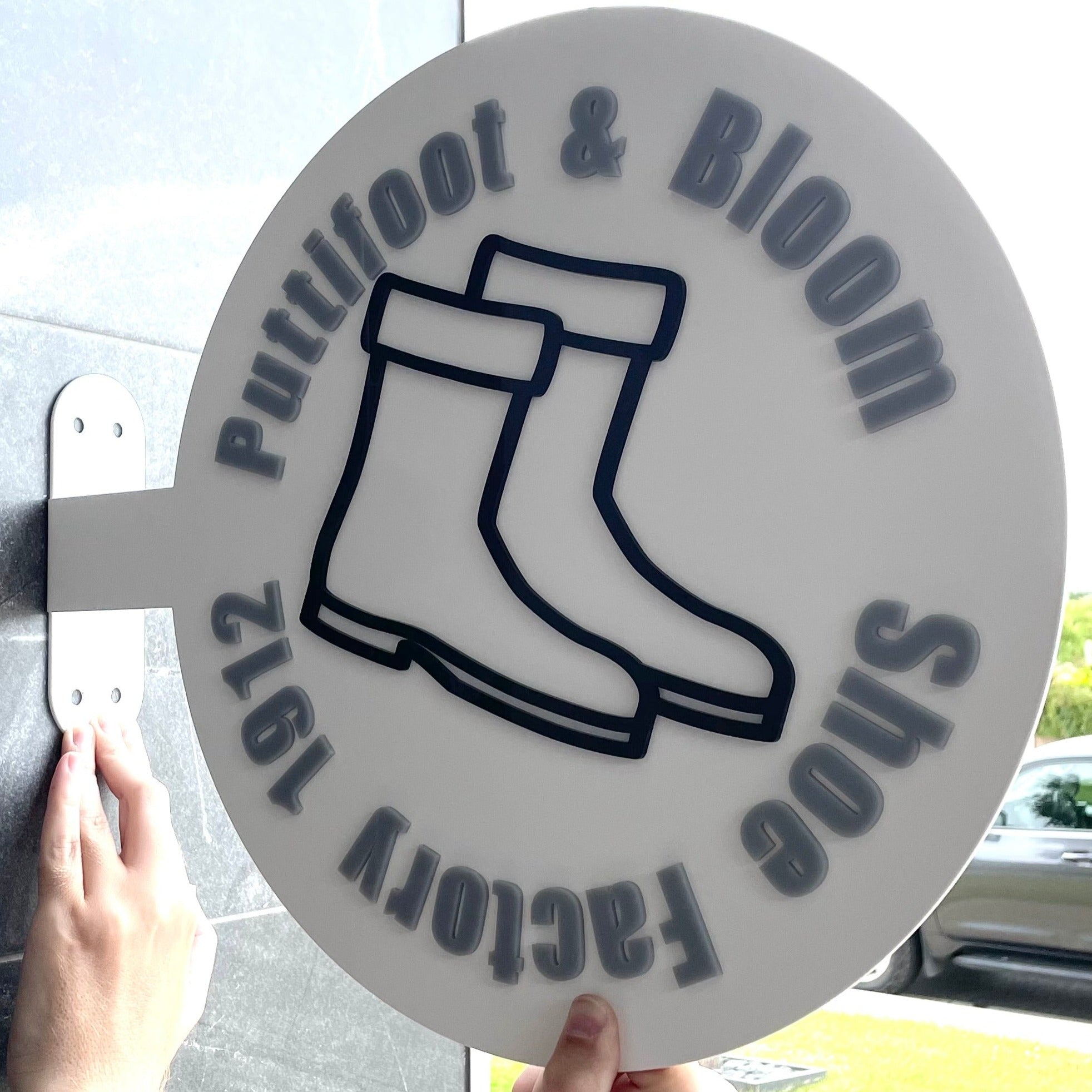 Rustic boots logo round blade sign for Rooted & Bloom