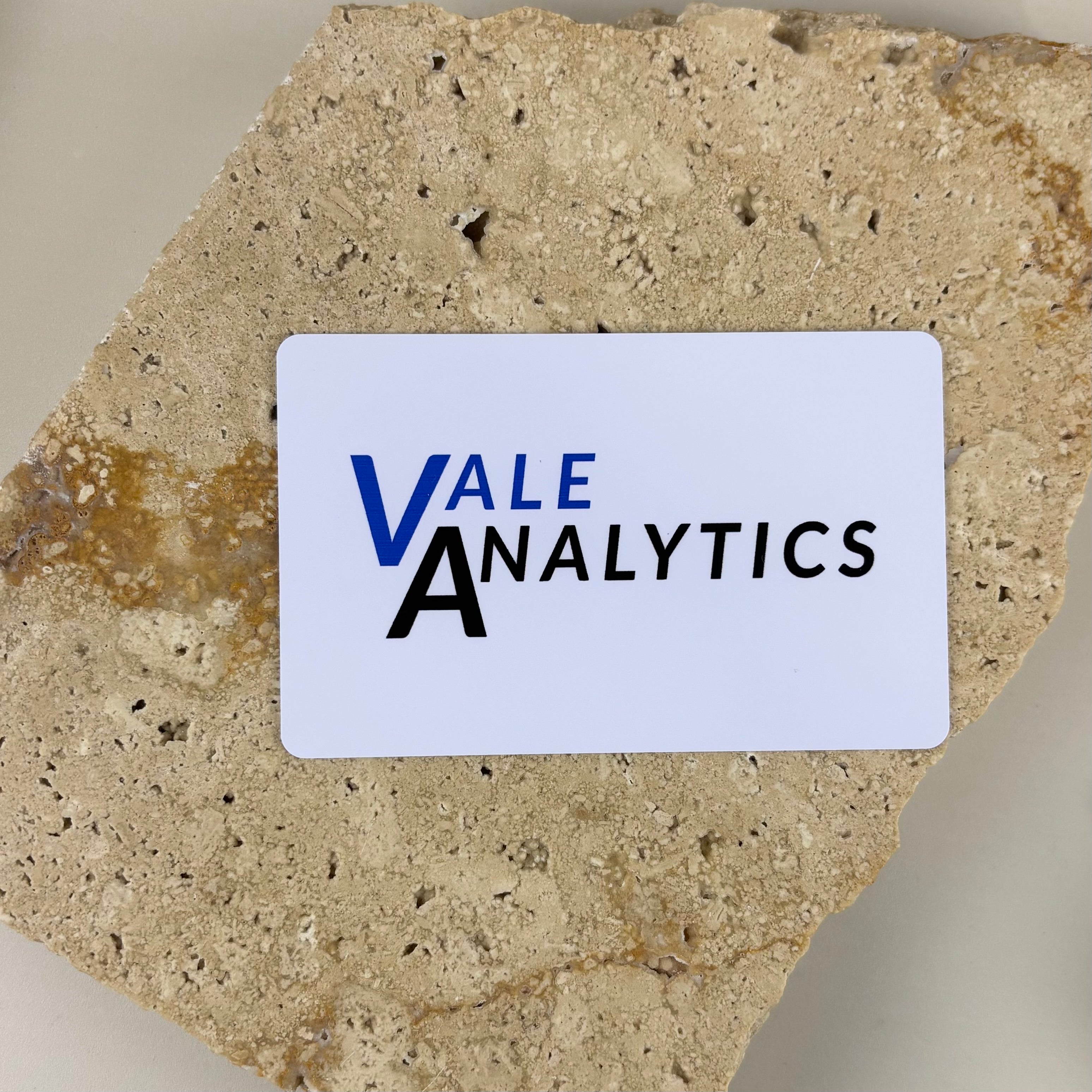 Branded NFC business card with company logo printed on white card, smart tap-to-share digital contact card for networking, business branding and modern contact sharing.