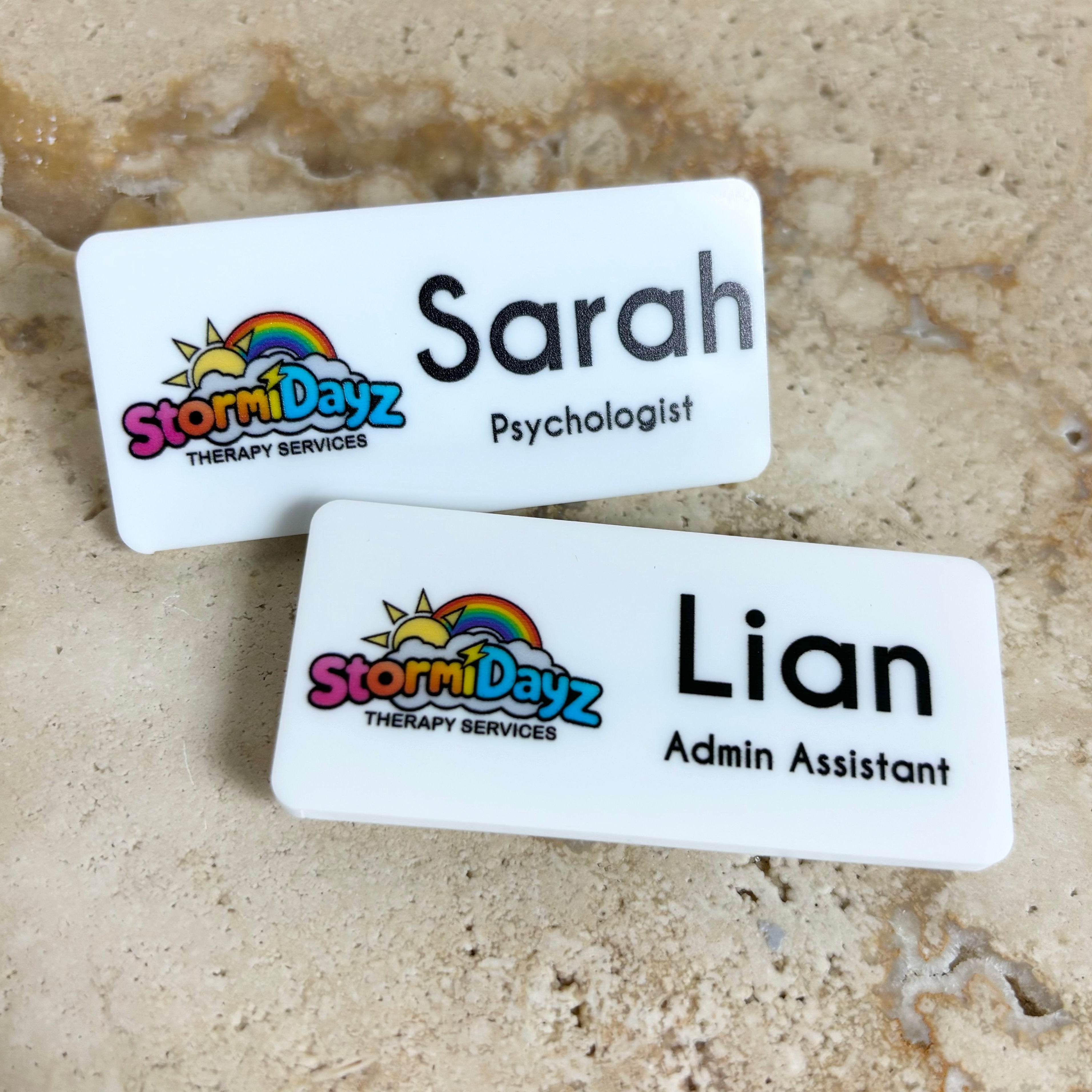 Personalised name badges with colourful branding