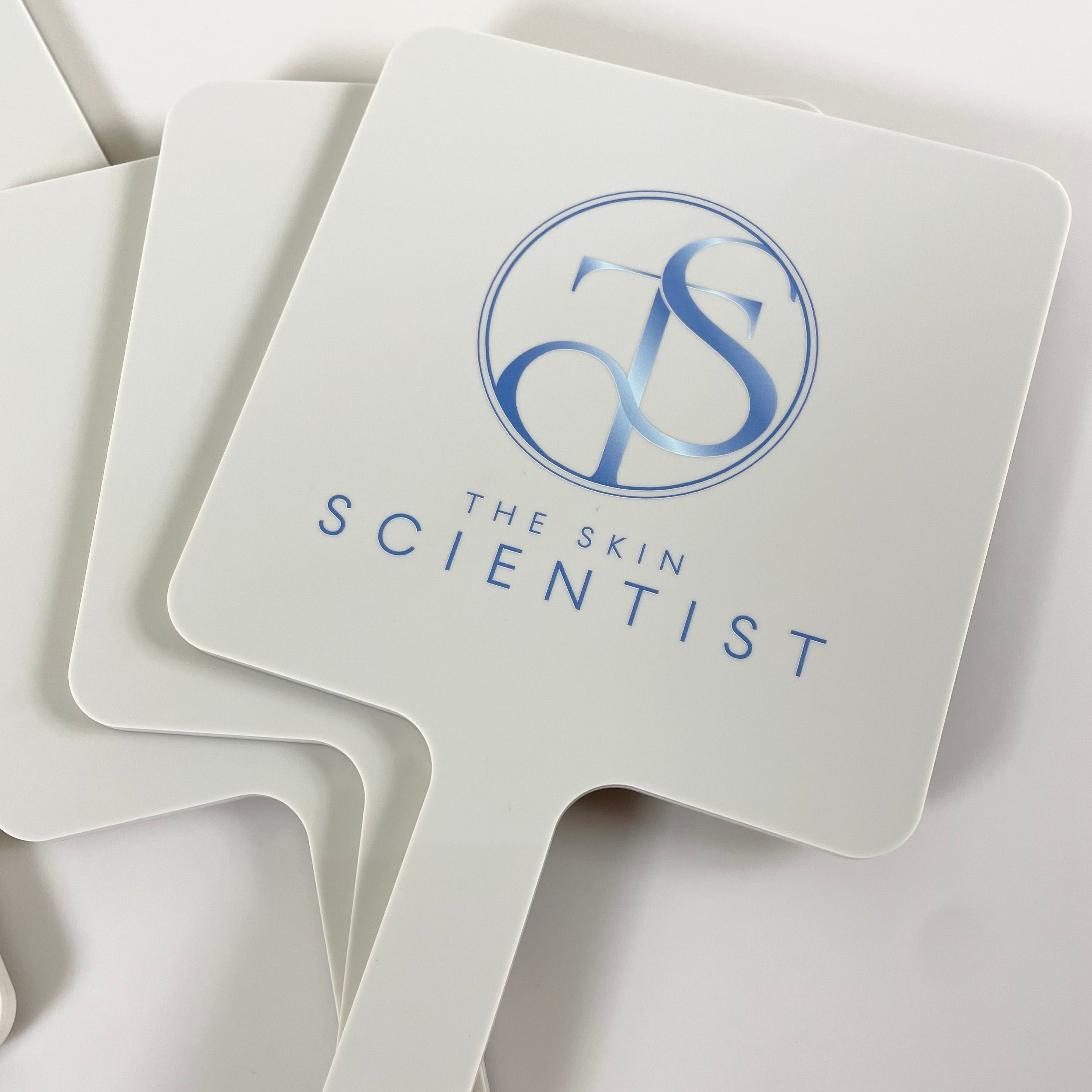 Square salon mirror with The Scientist Dentistry logo