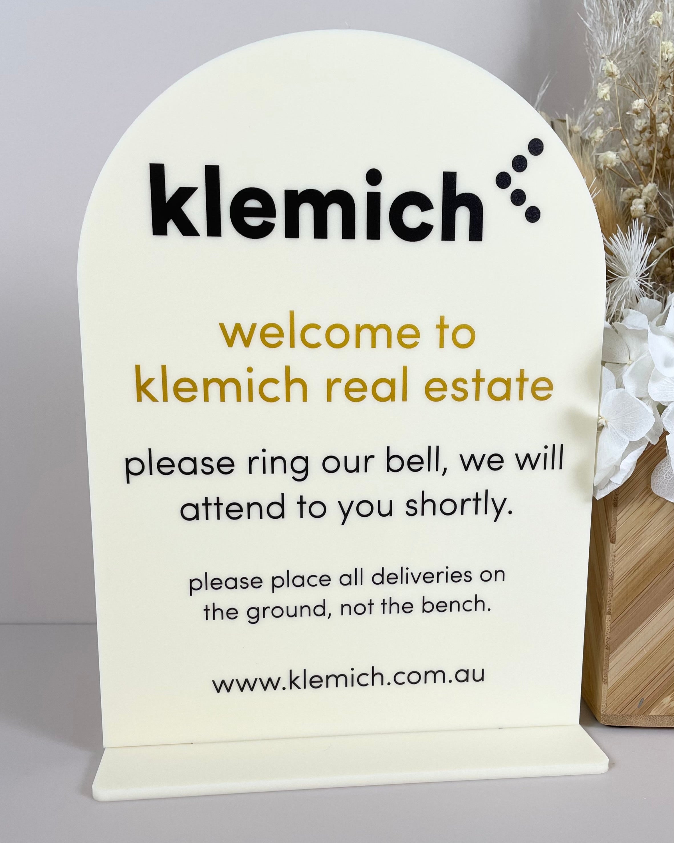 Custom business welcome sign for unattended desk or reception space