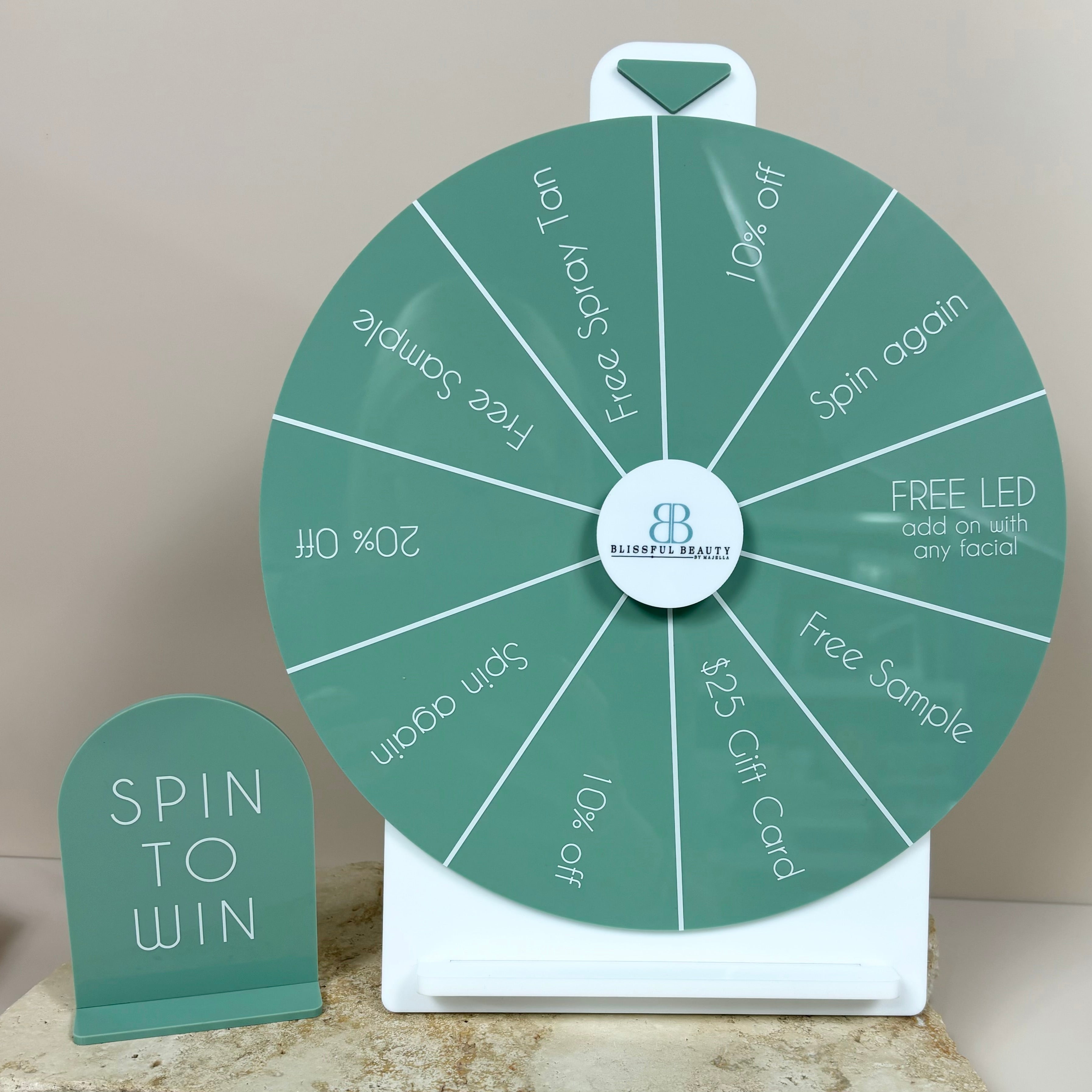 Green spin to win wheel with customised prize slots