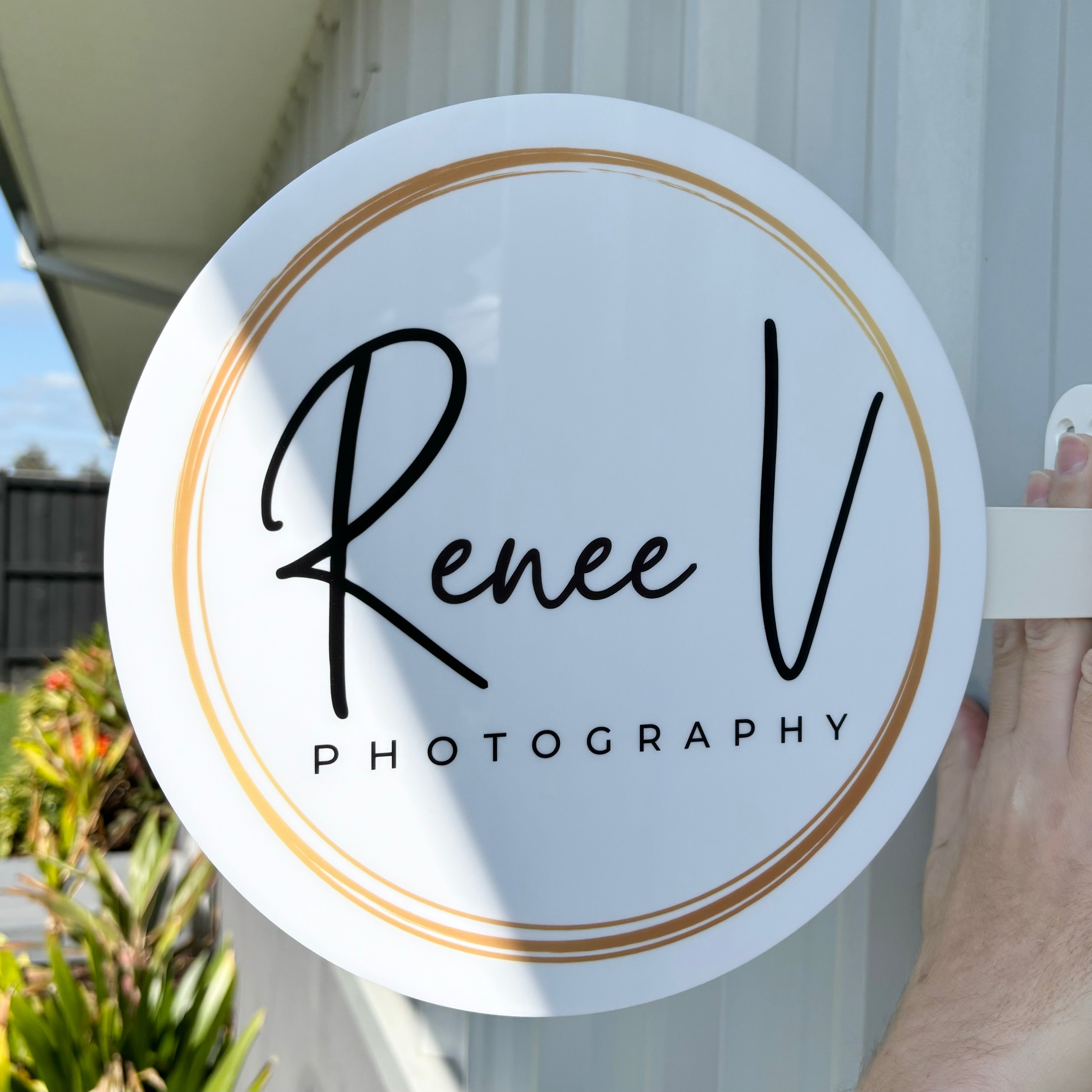 Custom round business sign for Renee V Photography
