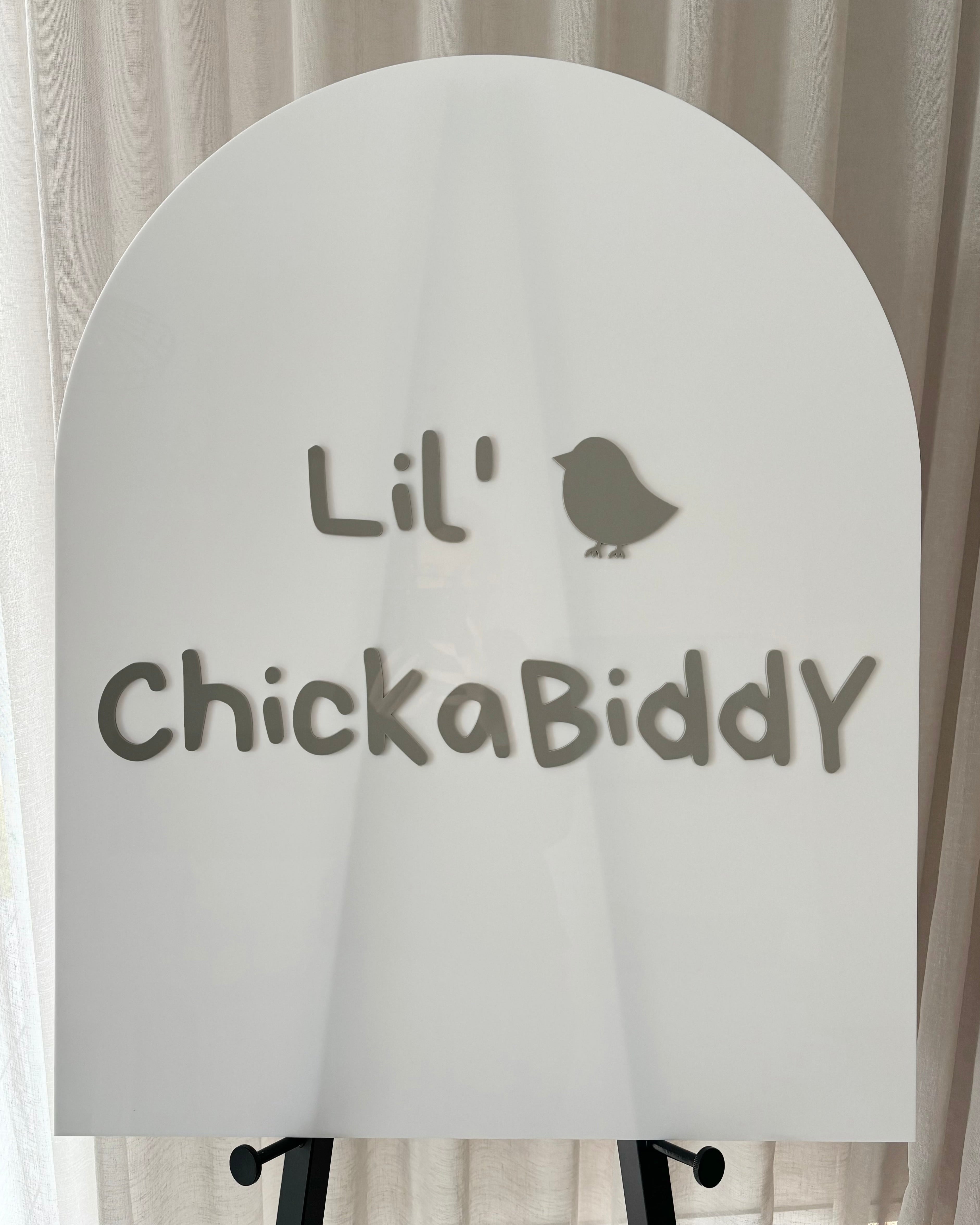 Light grey arch business sign with modern font