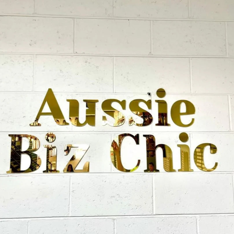 custom business sign with gold lettering