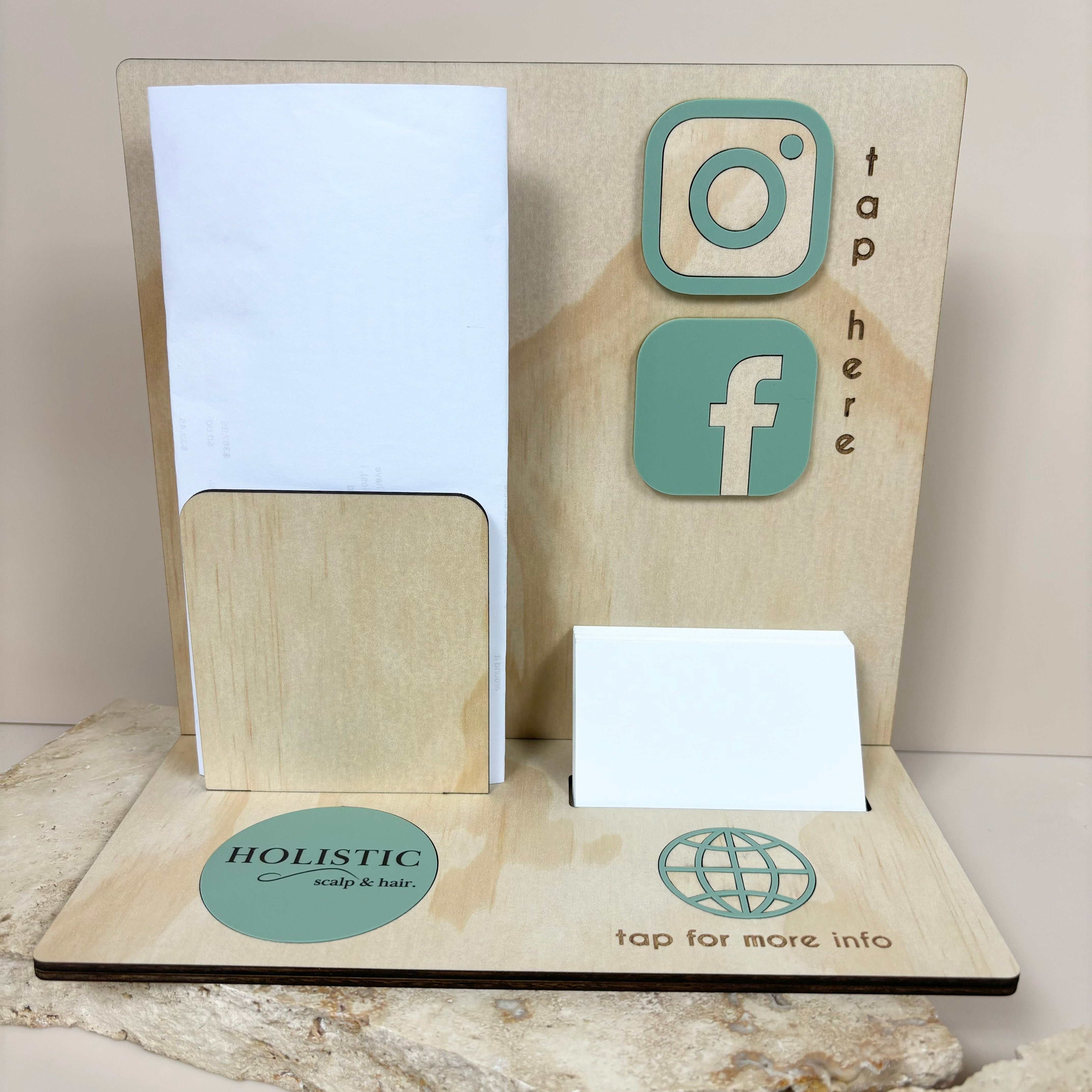 NFC info stand with integrated card and brochure holder, personalised branding with website and social media icons.