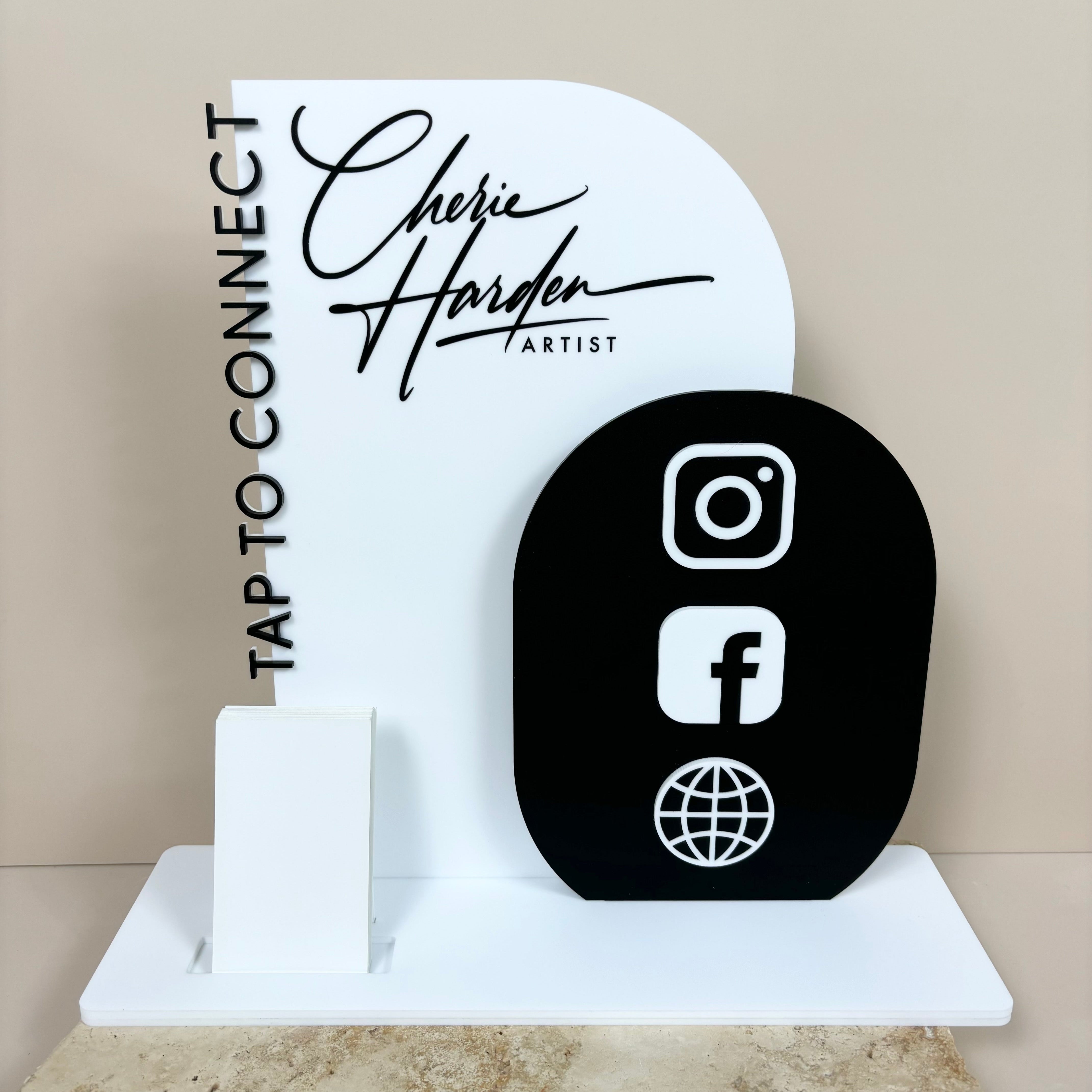 Pink NFC business display for life coaching with tap to connect icons