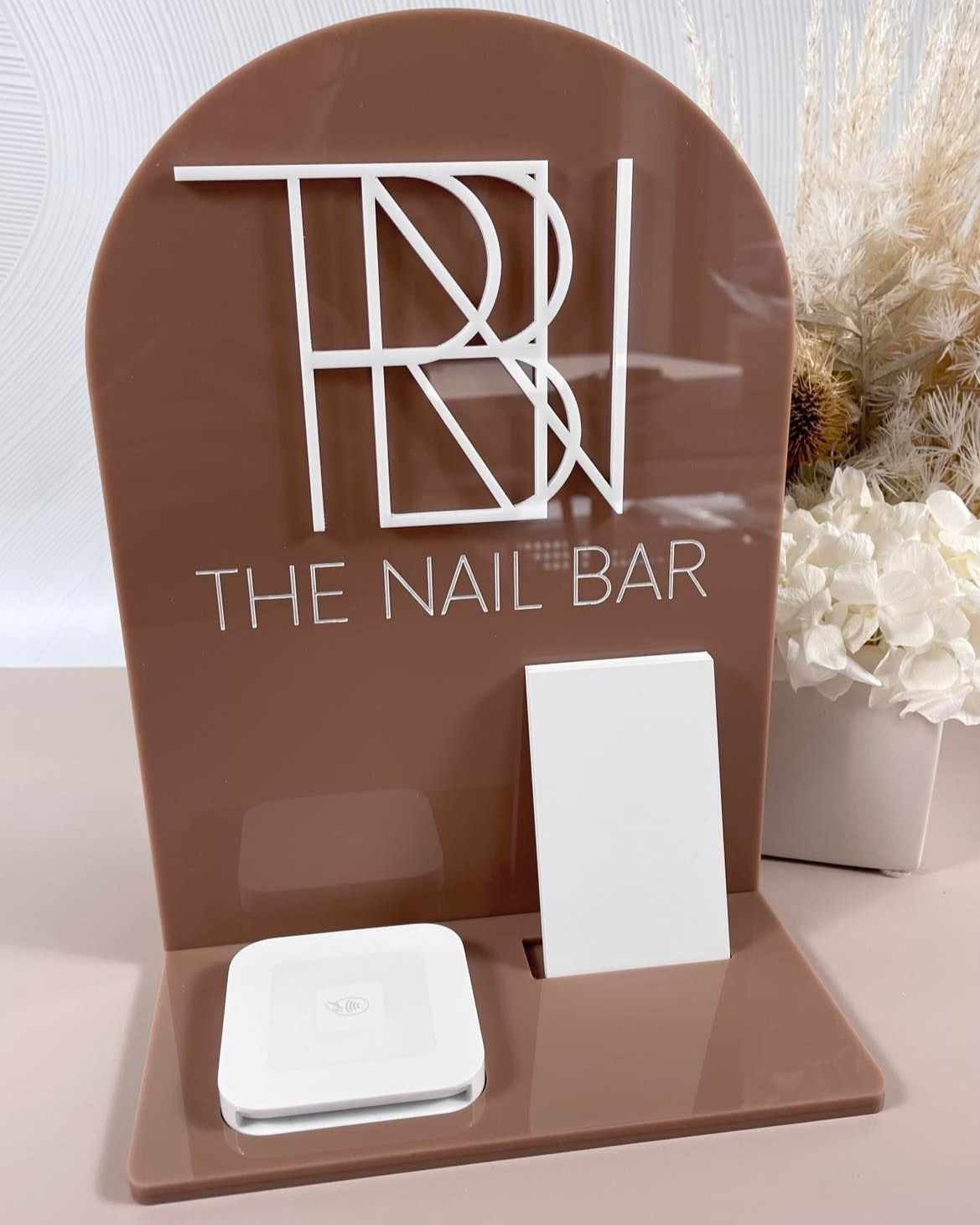 Branded nail salon social media stand with square reader