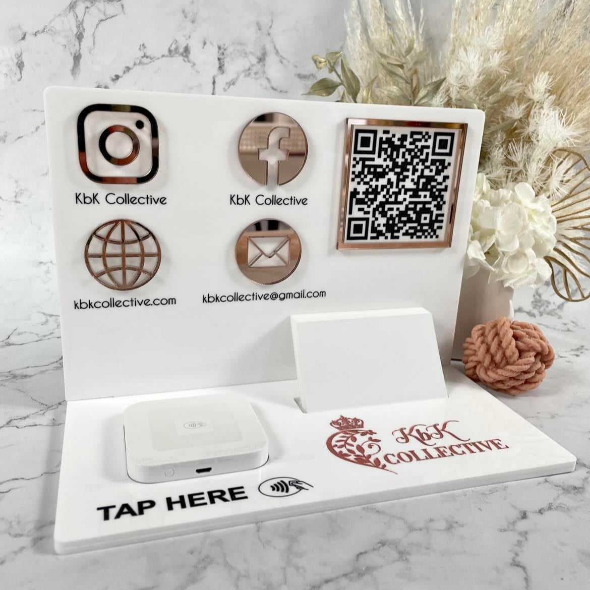 White social media display stand with QR codes and card holder