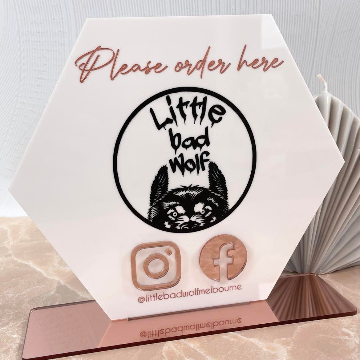 Custom blush pink hexagon social media display with business logo and QR codes