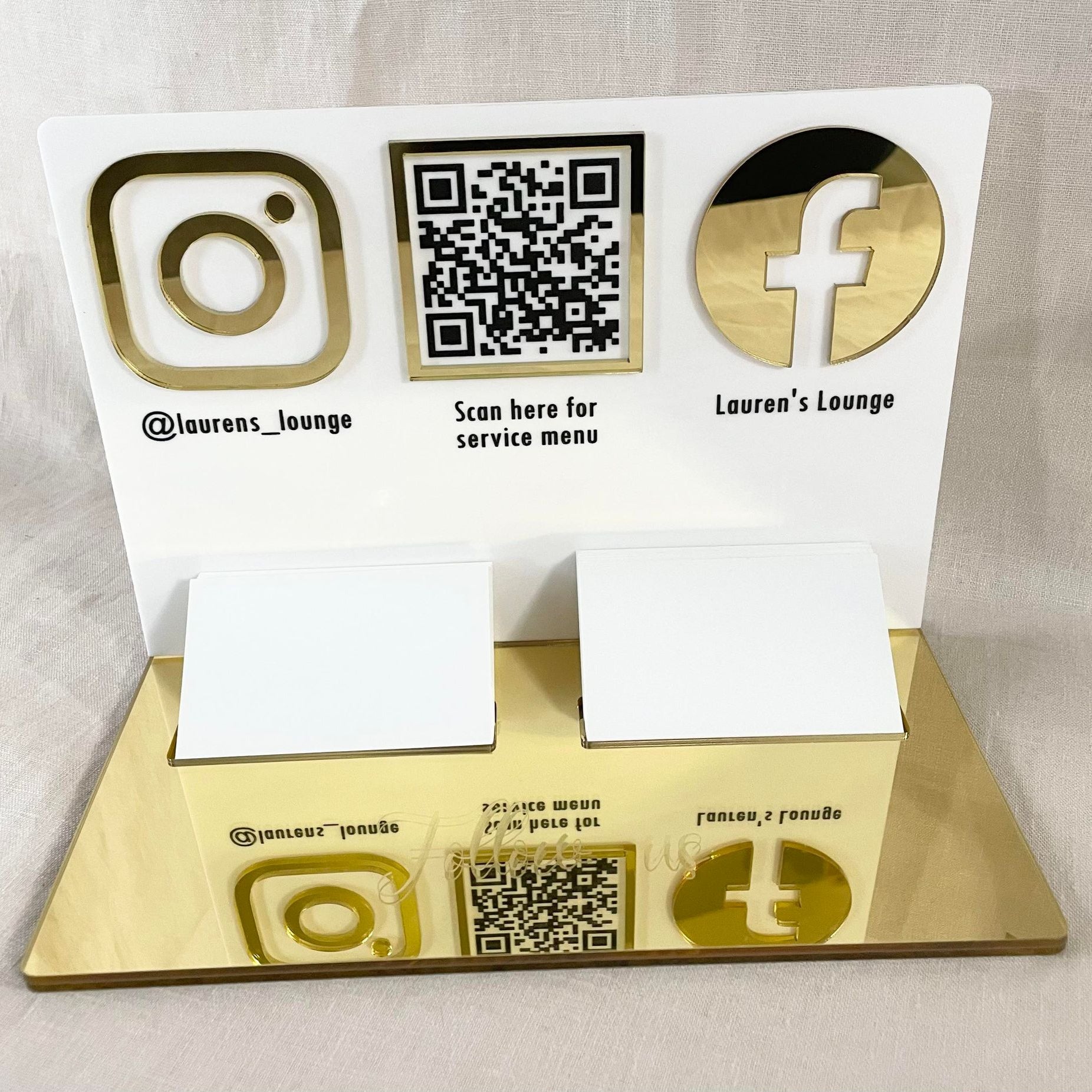 Gold acrylic display with QR code, Instagram icon and business card slot