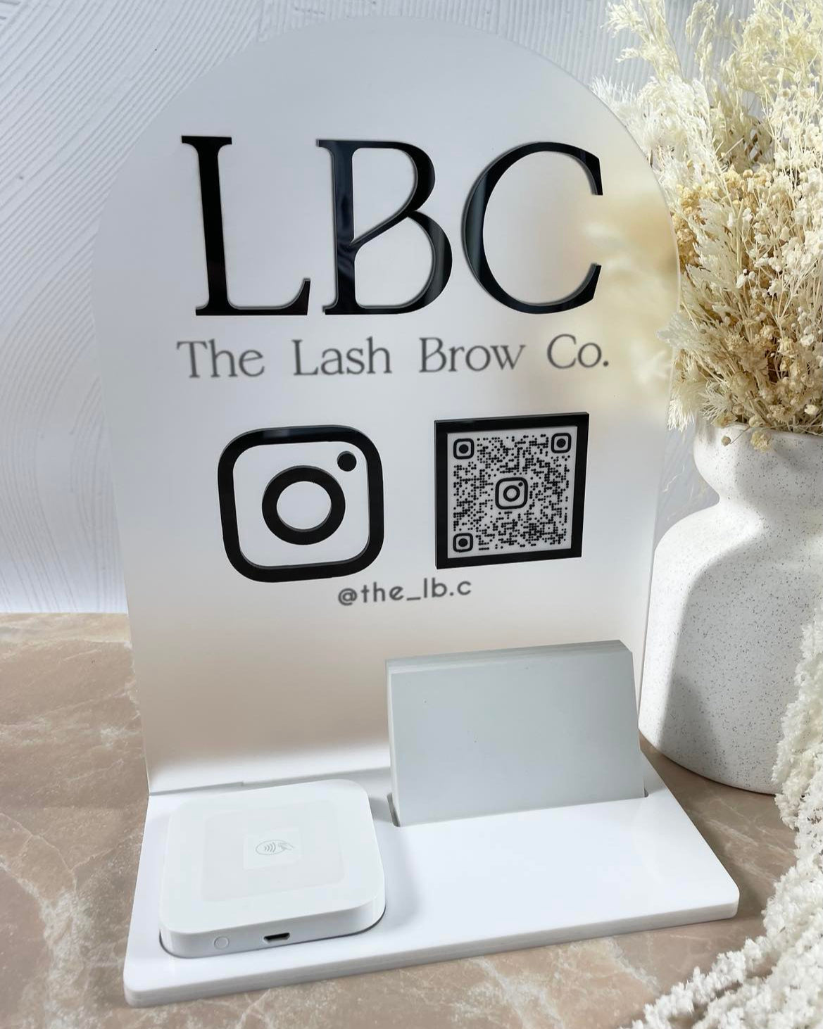 Lash and brow company branded card holder with social media icons