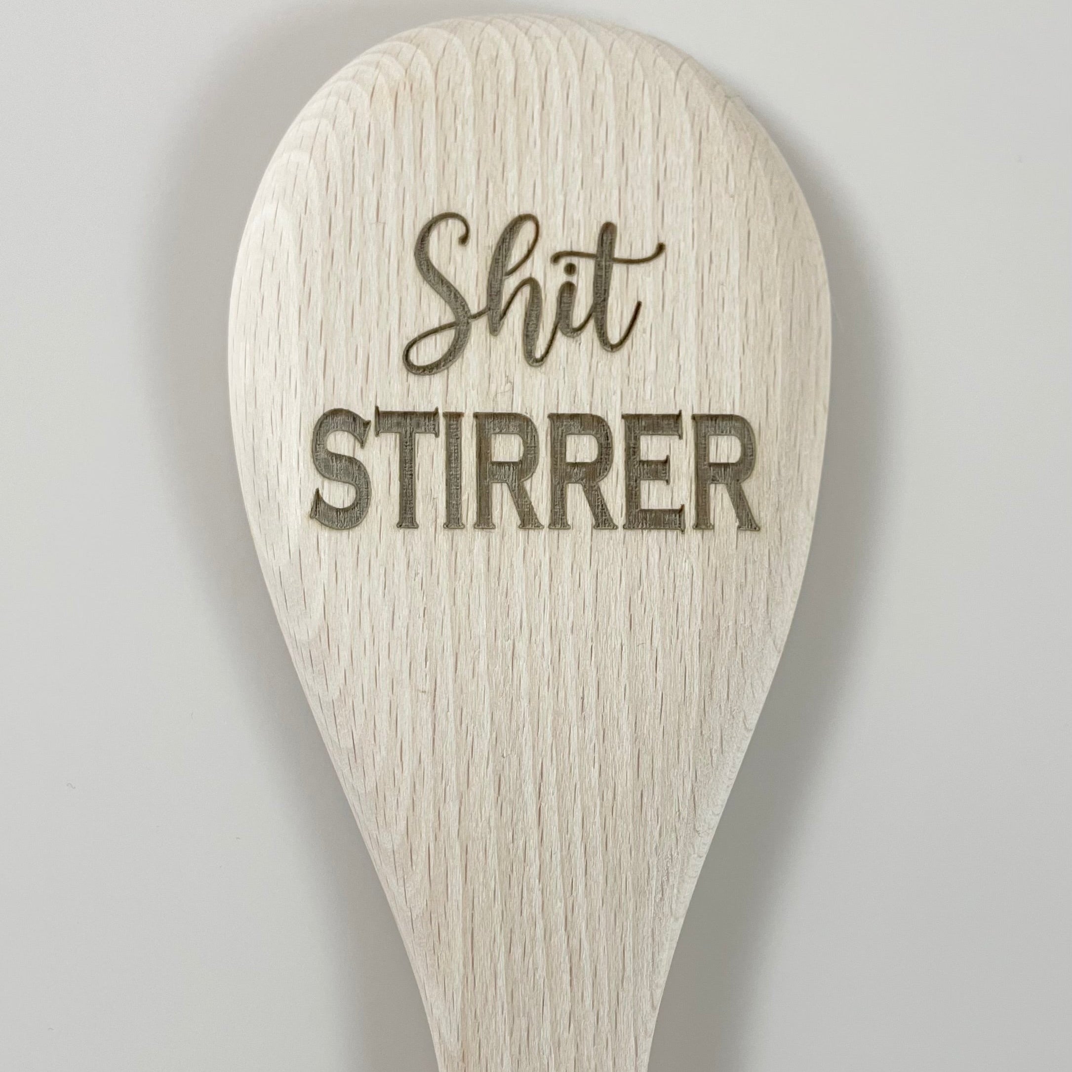 shit stirrier wooden spoon