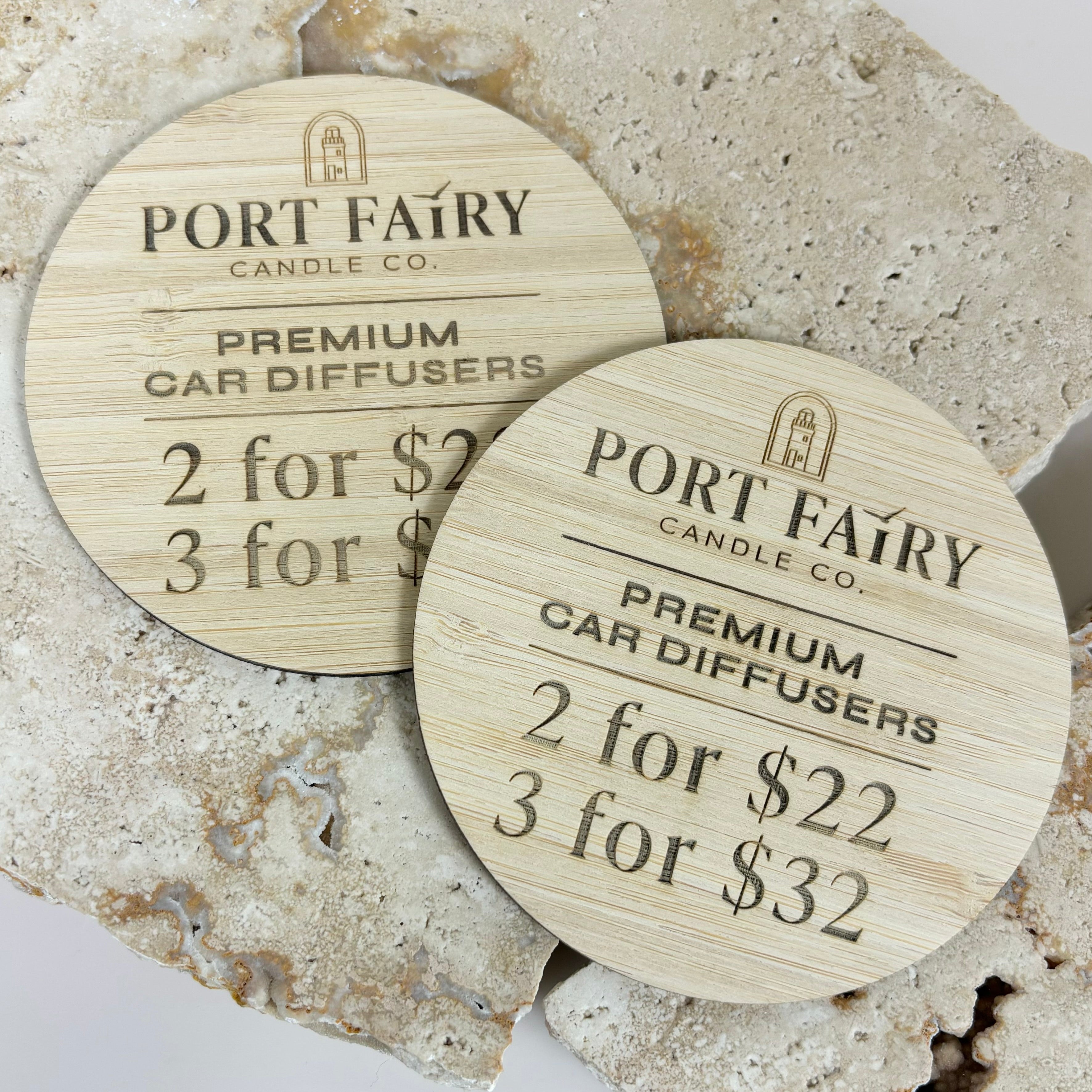 Engraved bamboo logo discs with custom text – flat lay props for retail and product photos