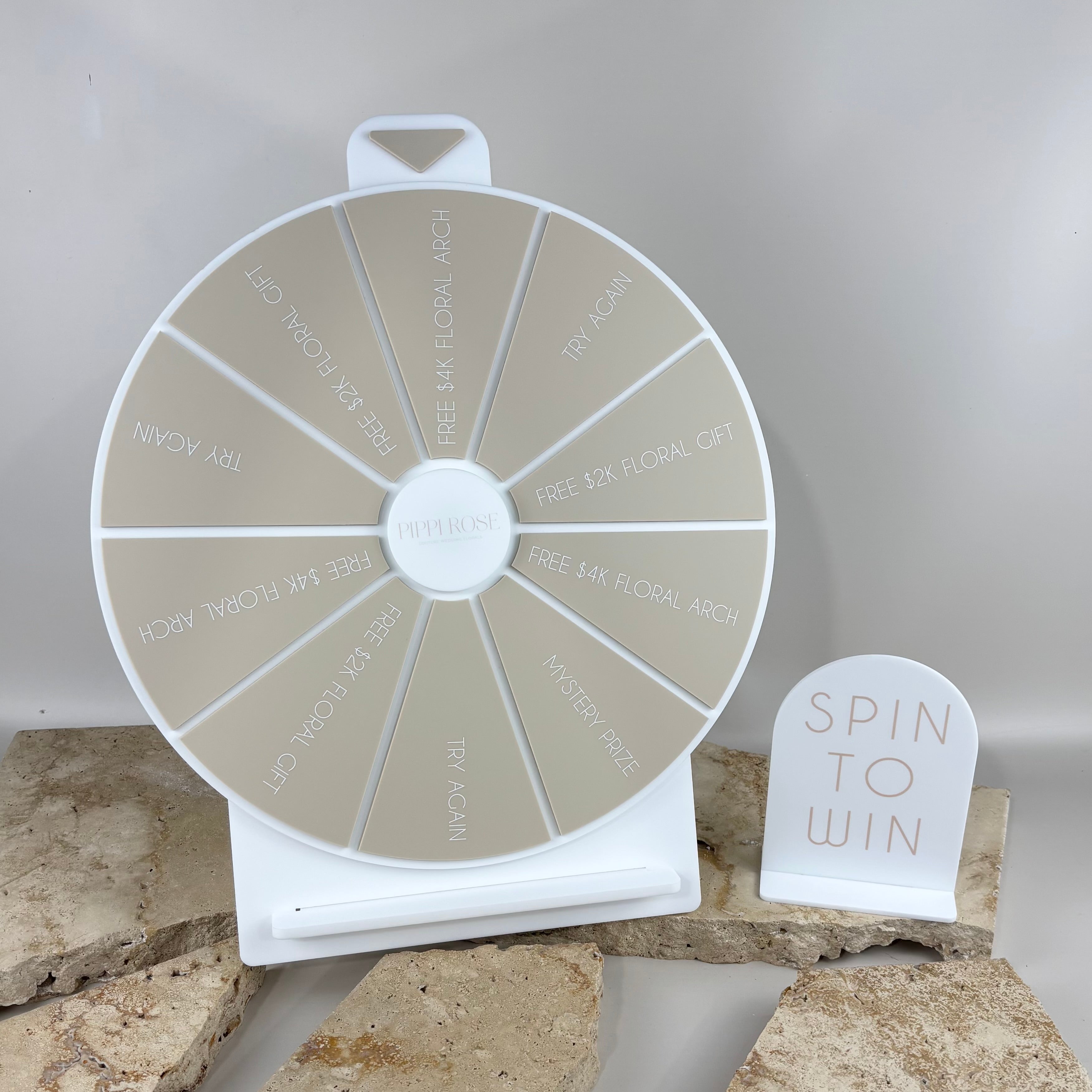 Custom acrylic spin the wheel with engraved prize segments, freestanding spin to win display for weddings, events and business promotions, personalised prize wheel with matching signage
