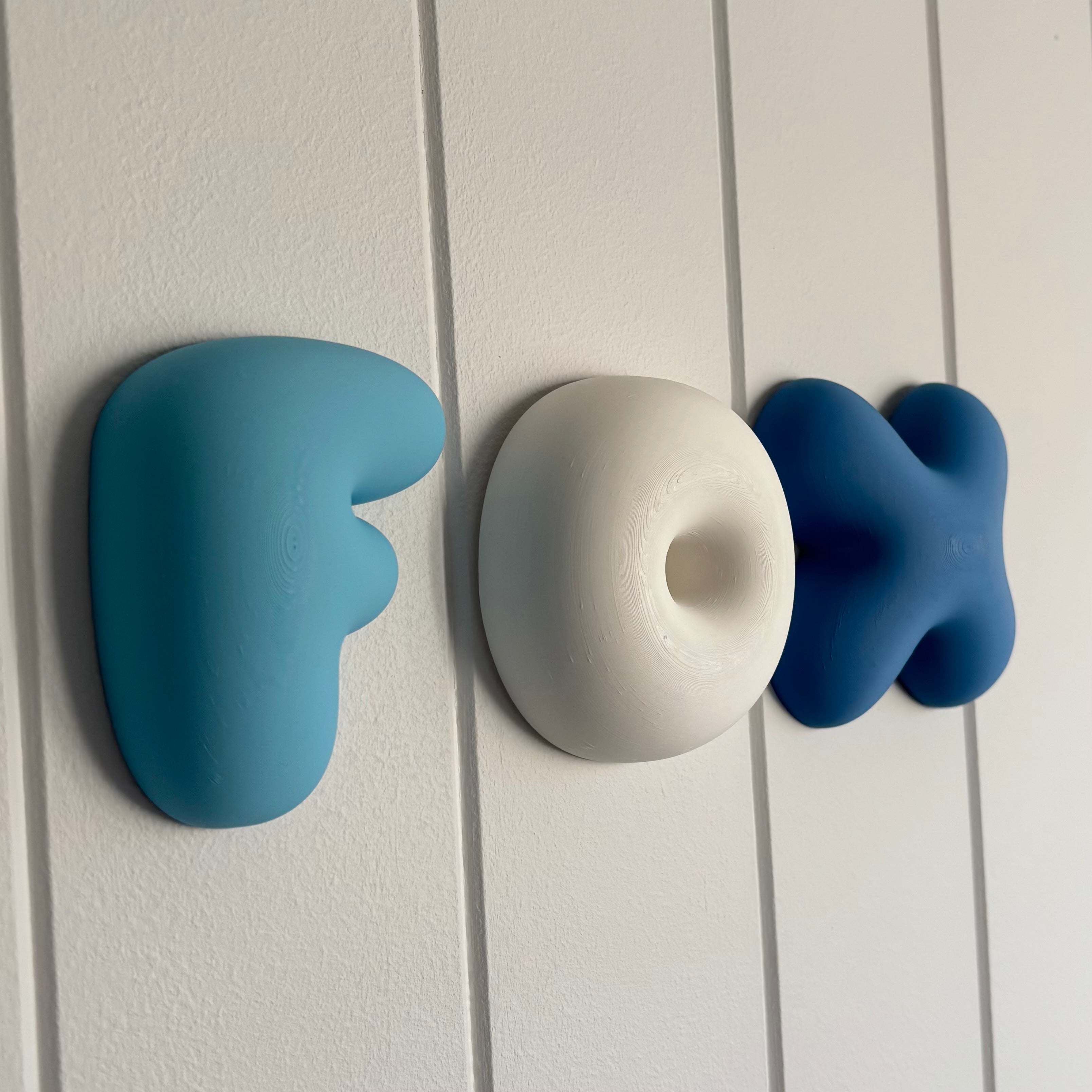 Personalised 3D printed bubble name wall letters in blue and white PLA, modern custom nursery name sign, kids bedroom wall décor, playroom decoration and personalised baby name wall art.
