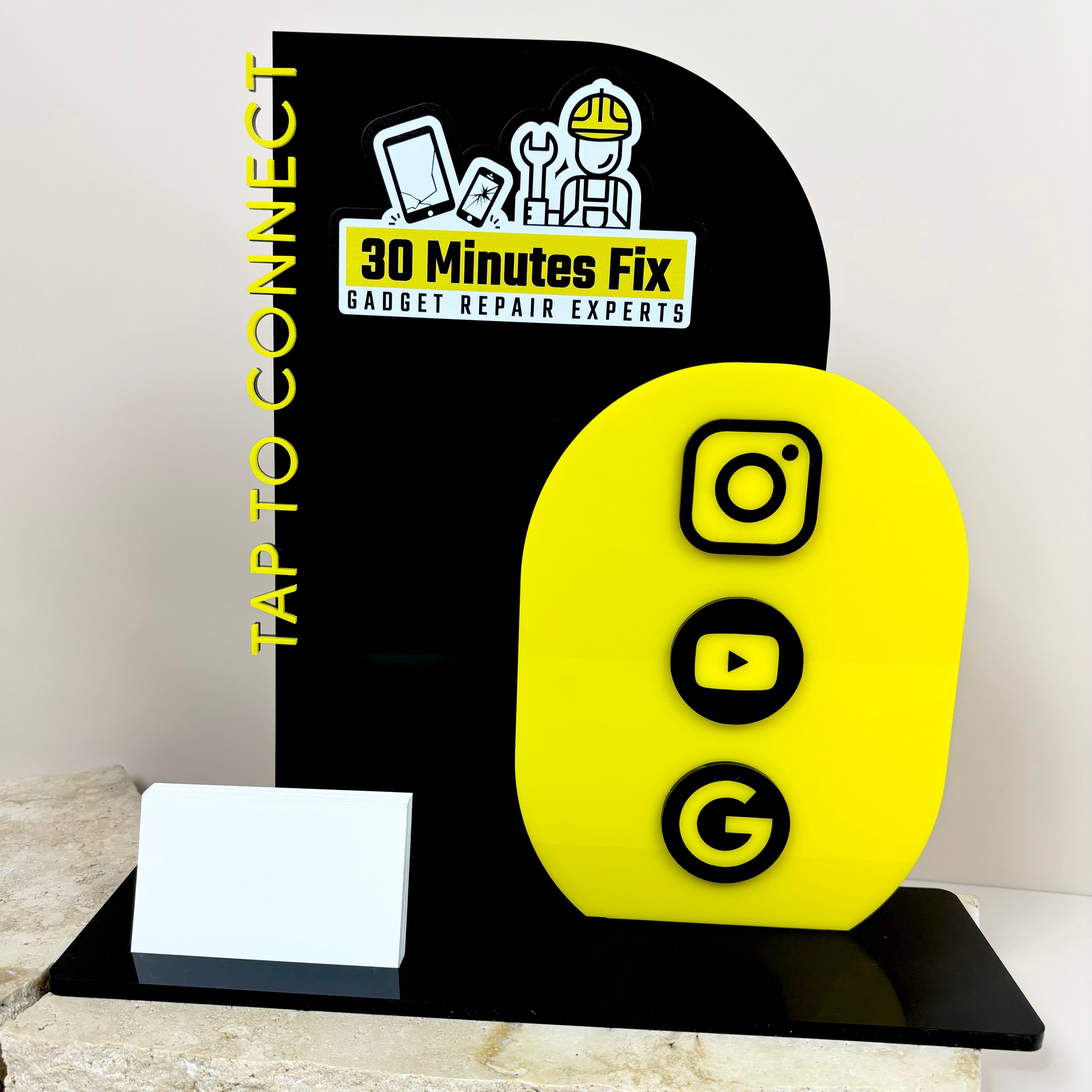 Yellow and black custom NFC info stand for 30 Minute Fix with social links
