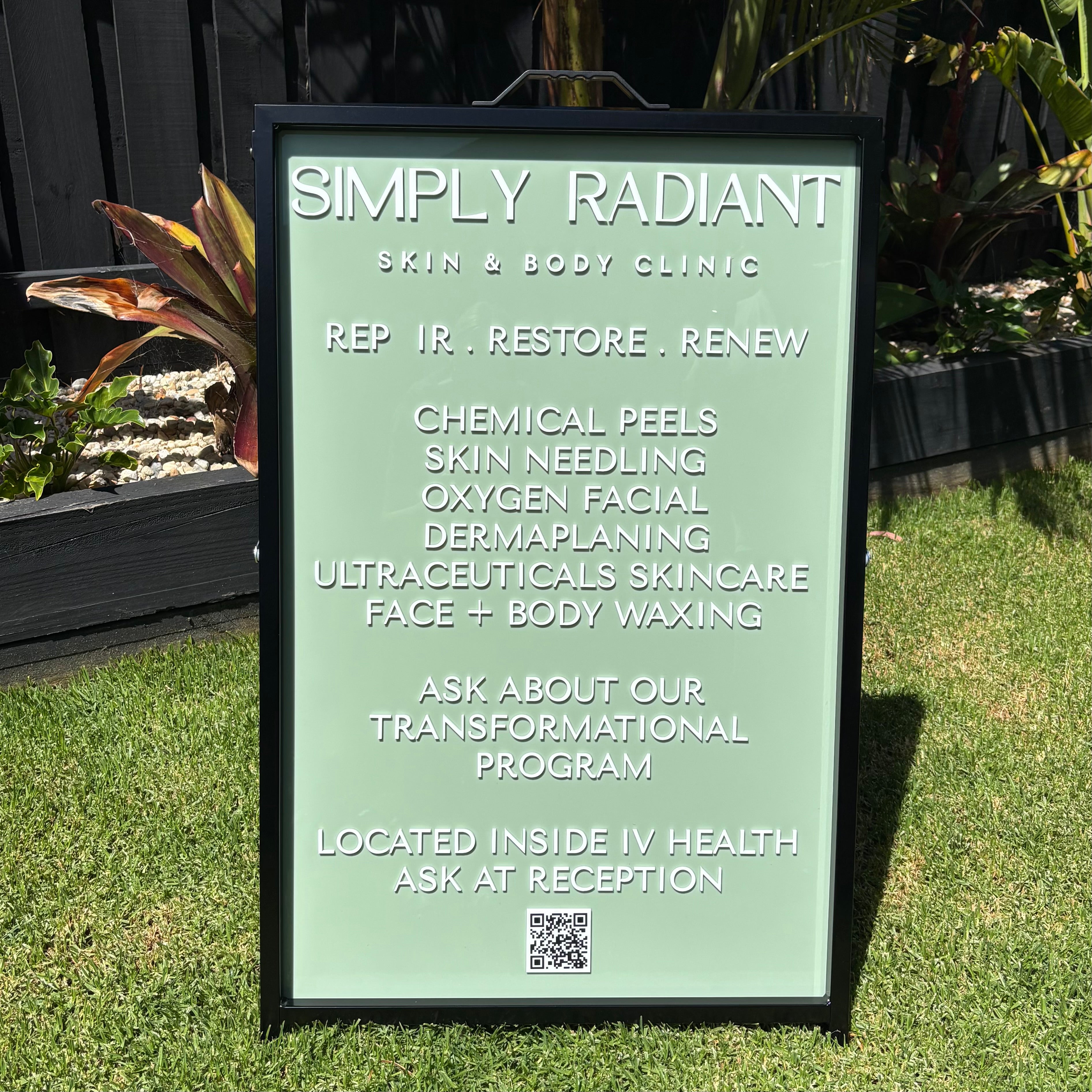 Custom A-frame skin clinic sign with sage green acrylic panel and raised white lettering for Simply Radiant Skin & Body Clinic, outdoor business signage Australia