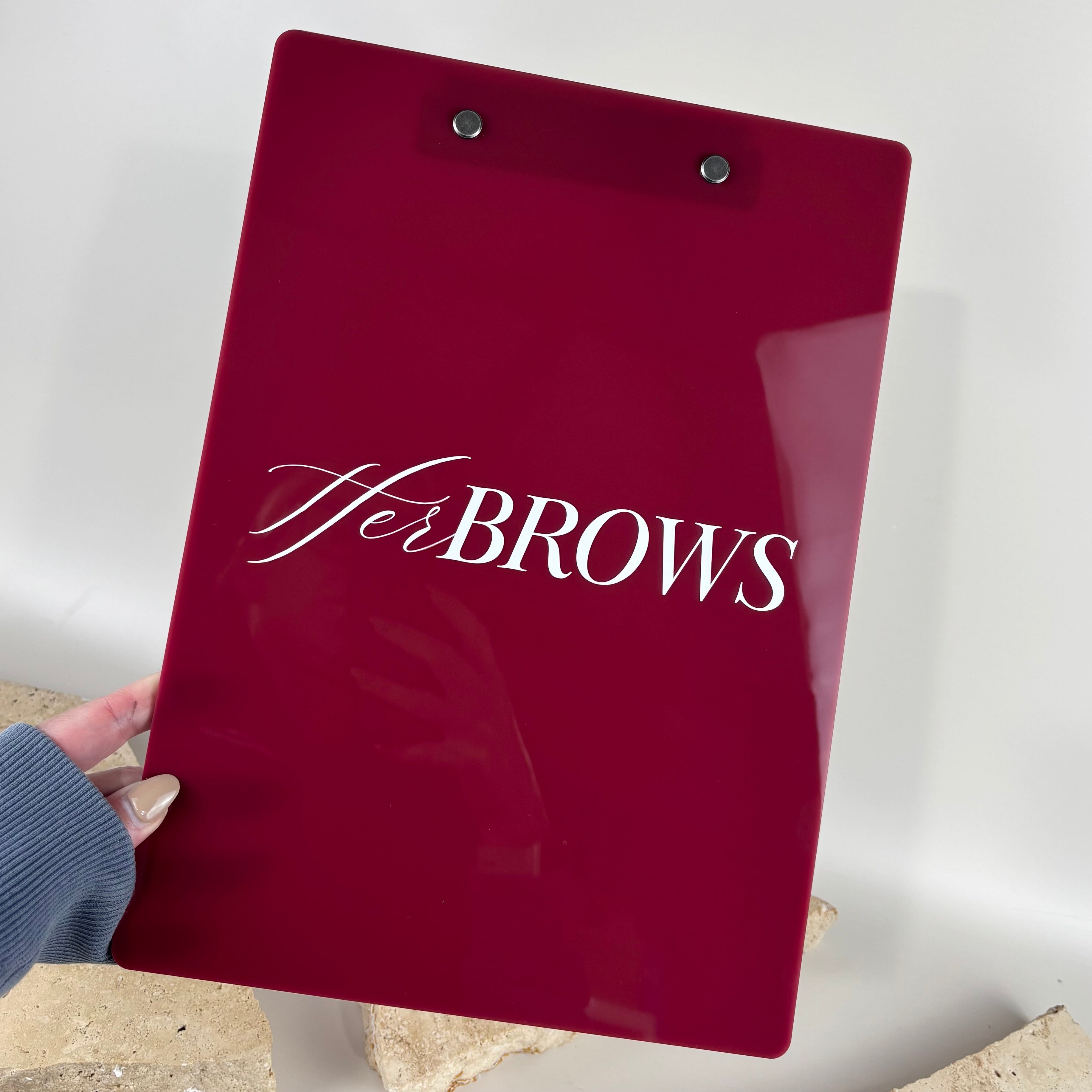 Custom branded acrylic clipboard with UV printed logo, personalised business clipboard for beauty salons, brow studios, lash technicians, hairdressers and clinics, professional A4 clipboard for client consultations, forms and appointment paperwork.