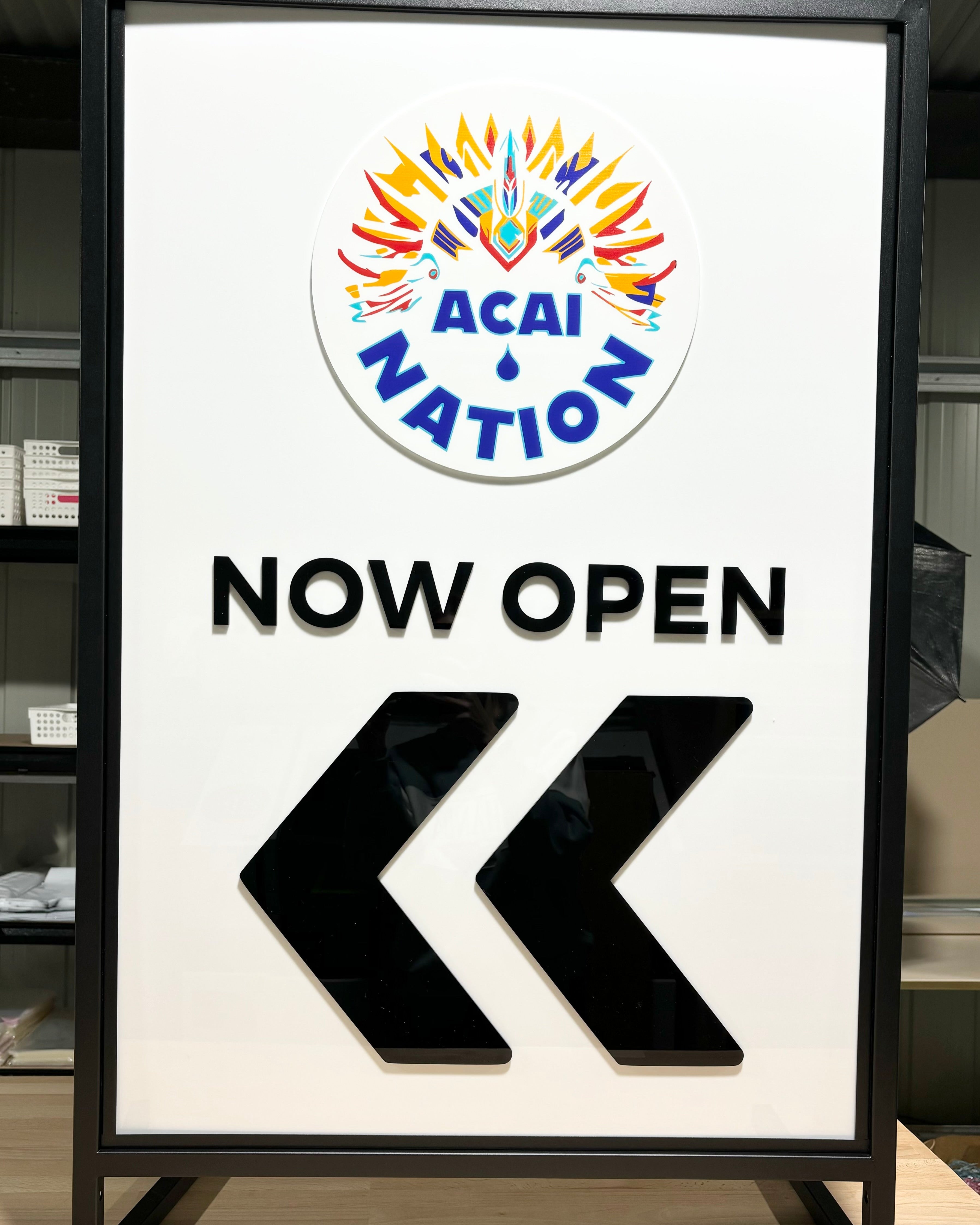 White outdoor T frame sign for acai bar and café promotions
