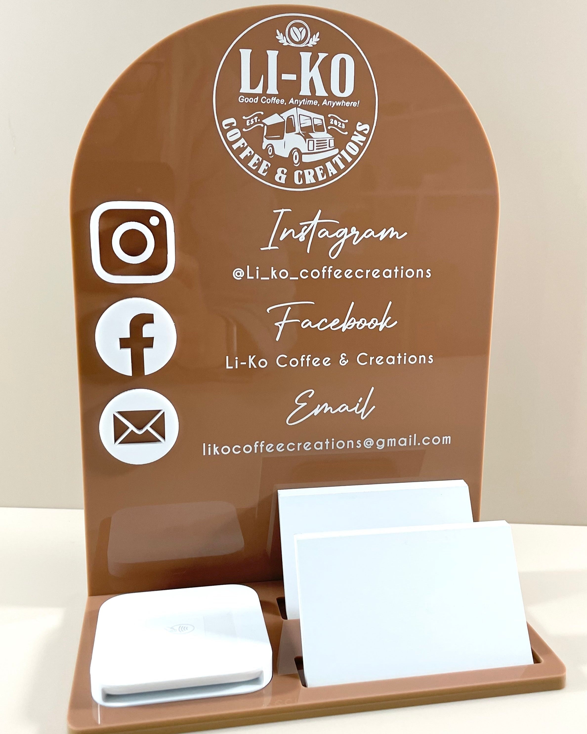 Brown acrylic counter display with multiple social media and square reader