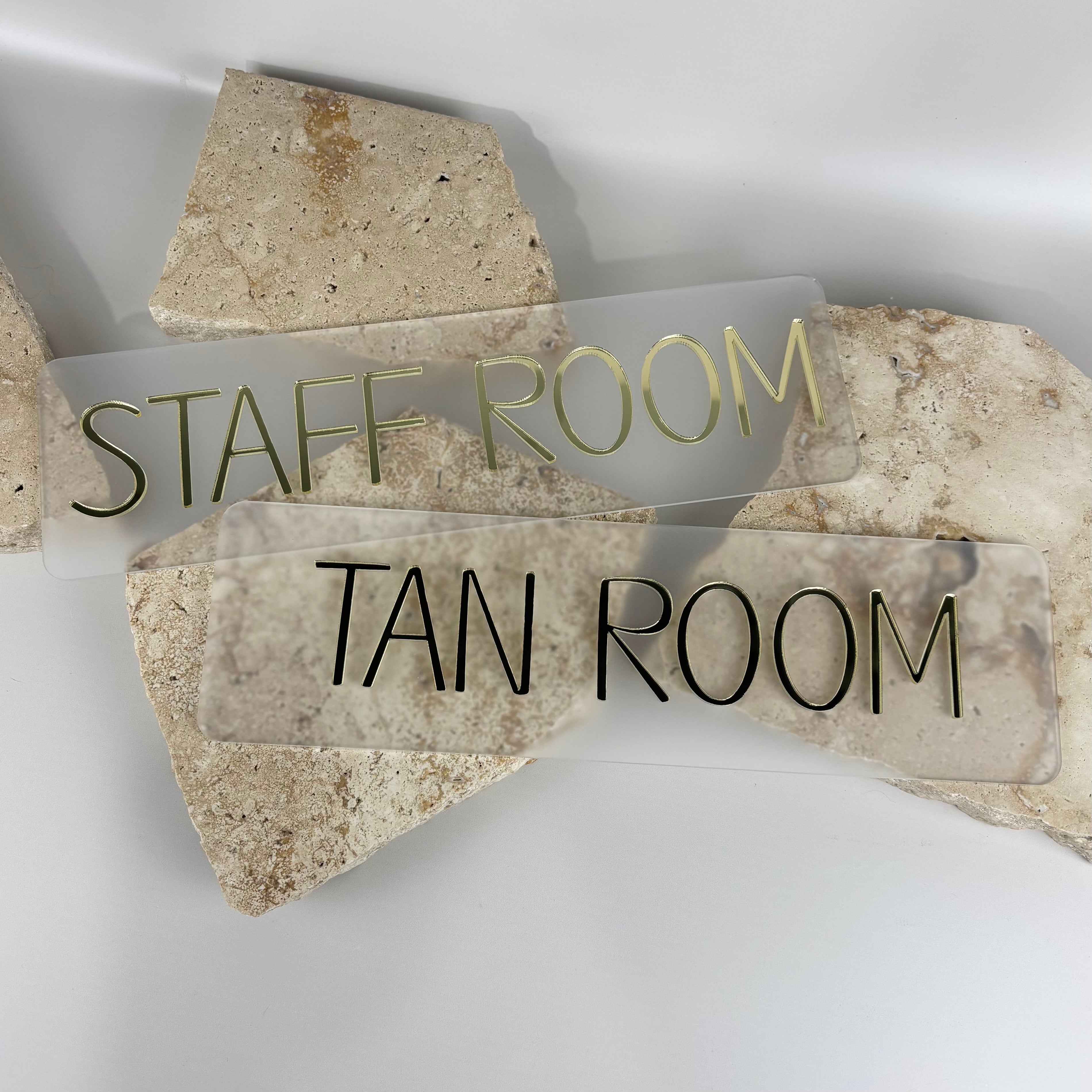 Alternative Option 2:
Acrylic room sign featuring raised lettering on clear panel, minimalist door sign for commercial interiors