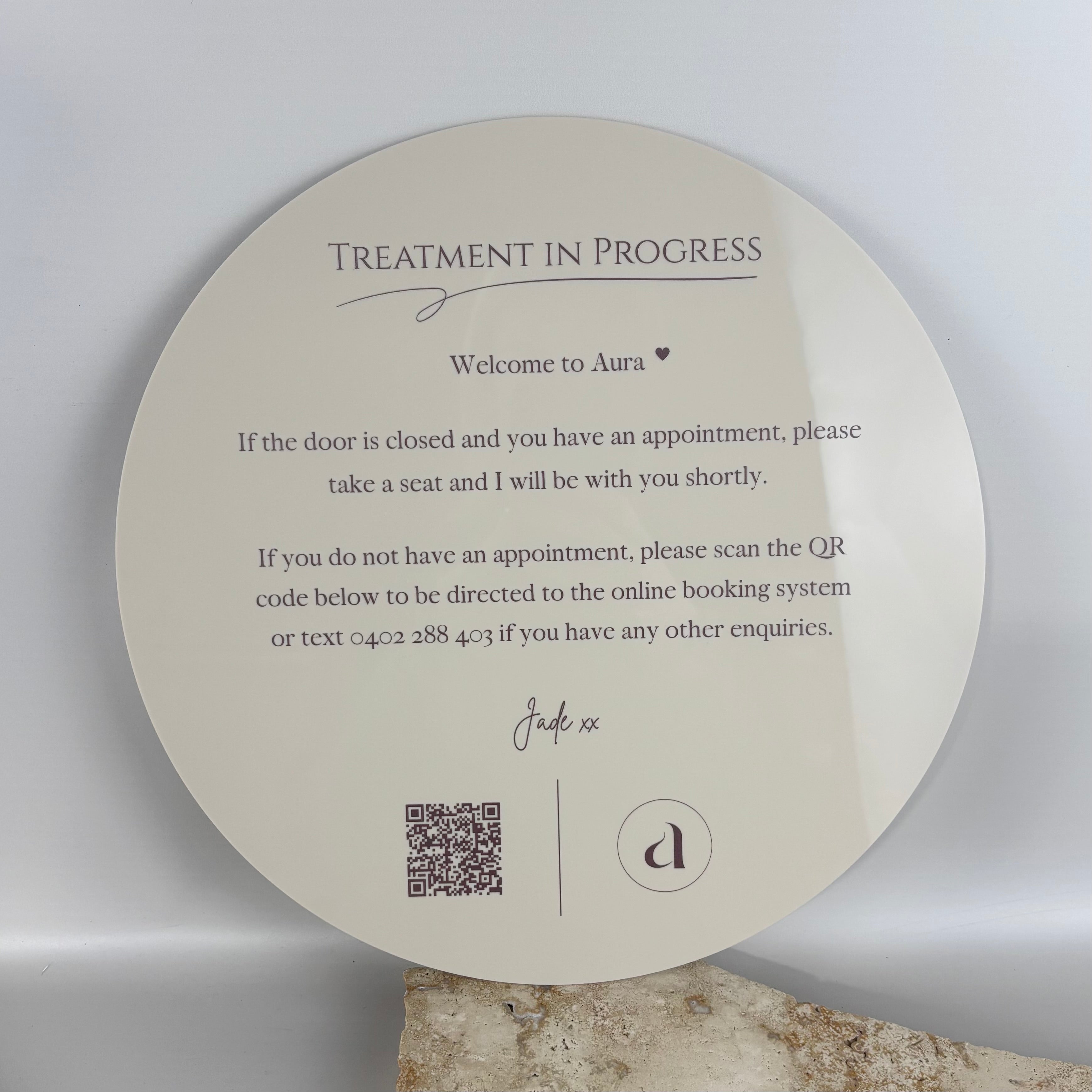 Custom round acrylic treatment in progress sign with QR code, UV printed beauty salon signage, clinic waiting room sign, appointment booking display, professional reception and treatment room sign for beauty, cosmetic and wellness businesses.
