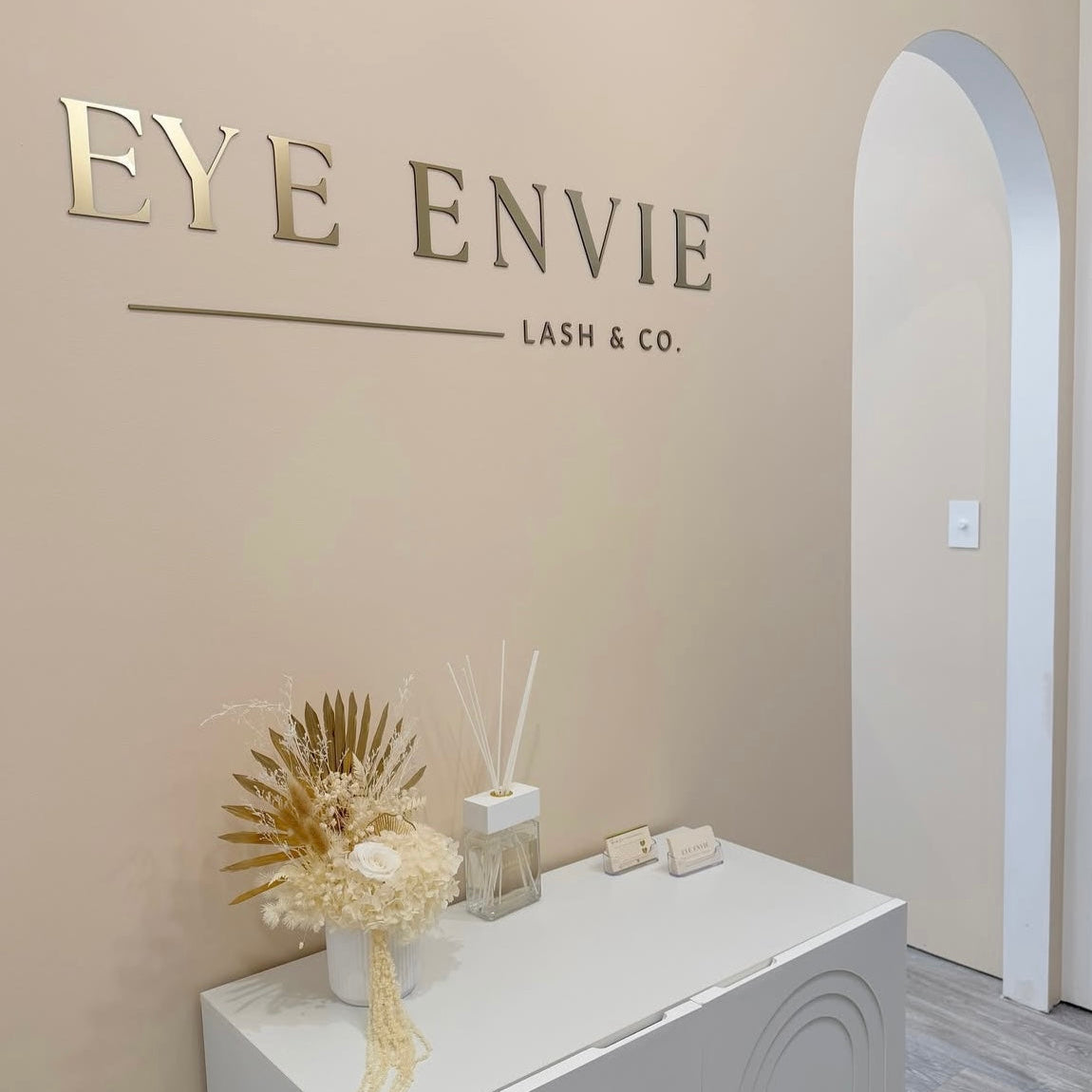 custom business sign with gold lettering