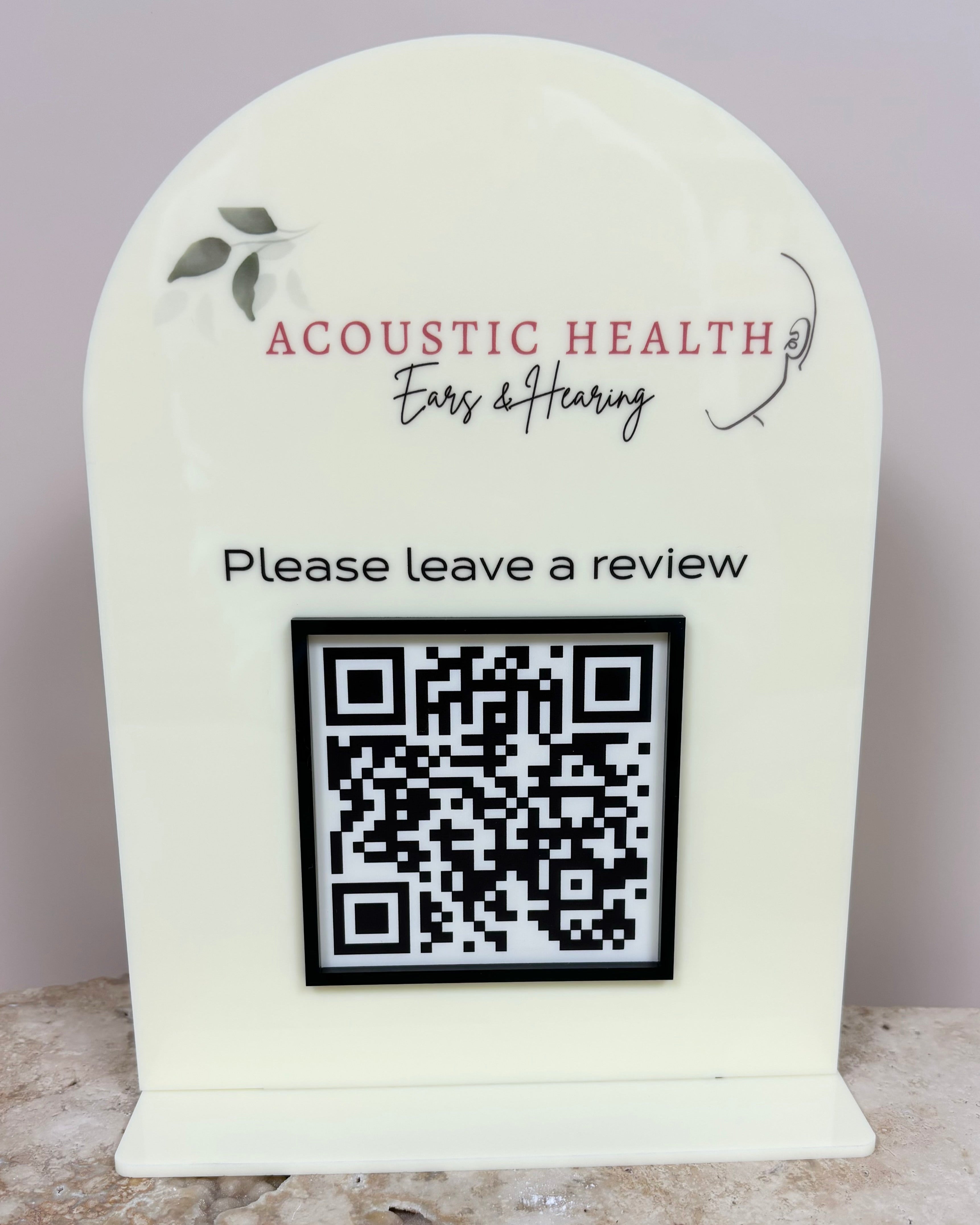 Rounded QR code sign for health and wellness clinic reviews