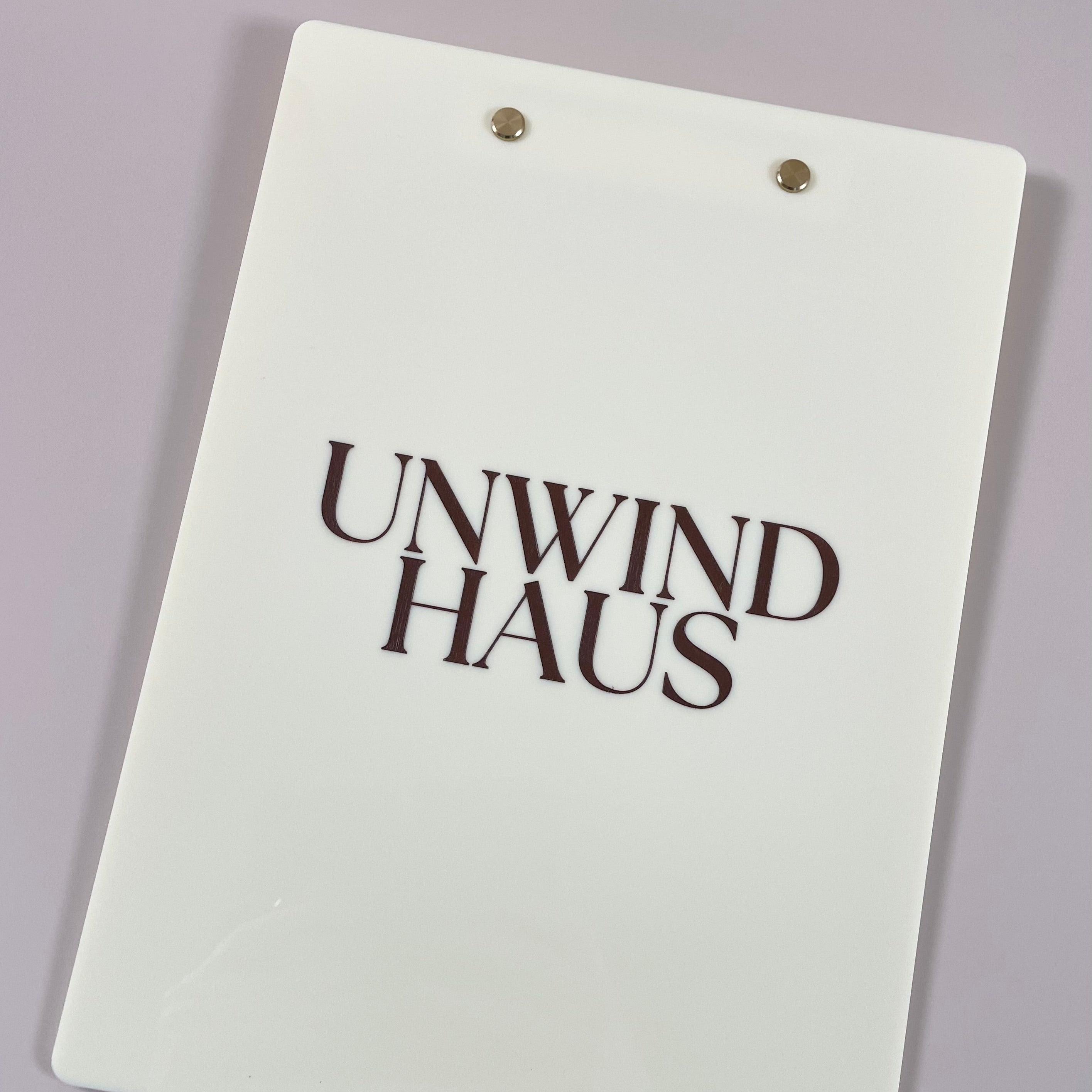 Custom clipboards with minimalist branding for office use