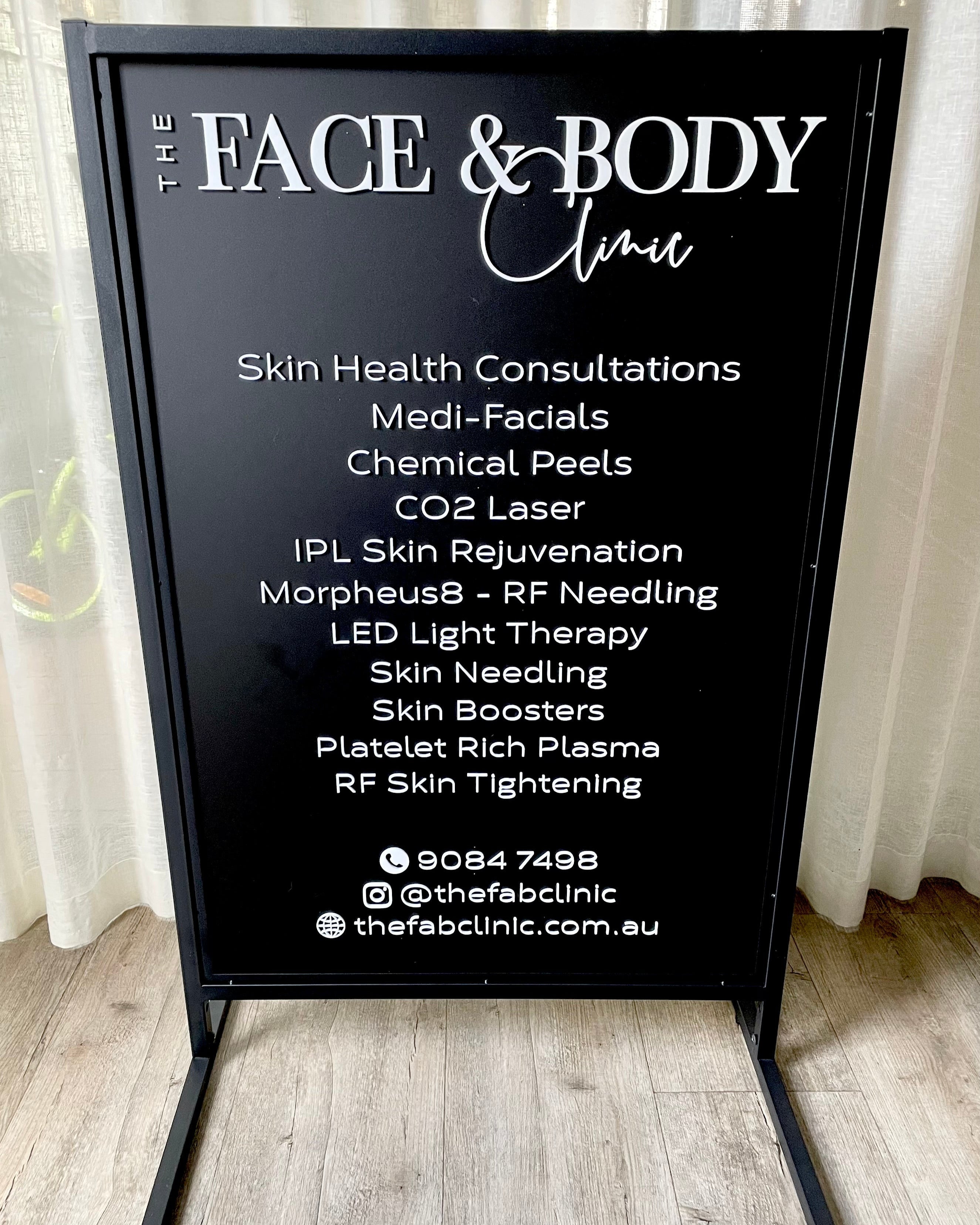Black 3D acrylic T frame sign for skin health consultations