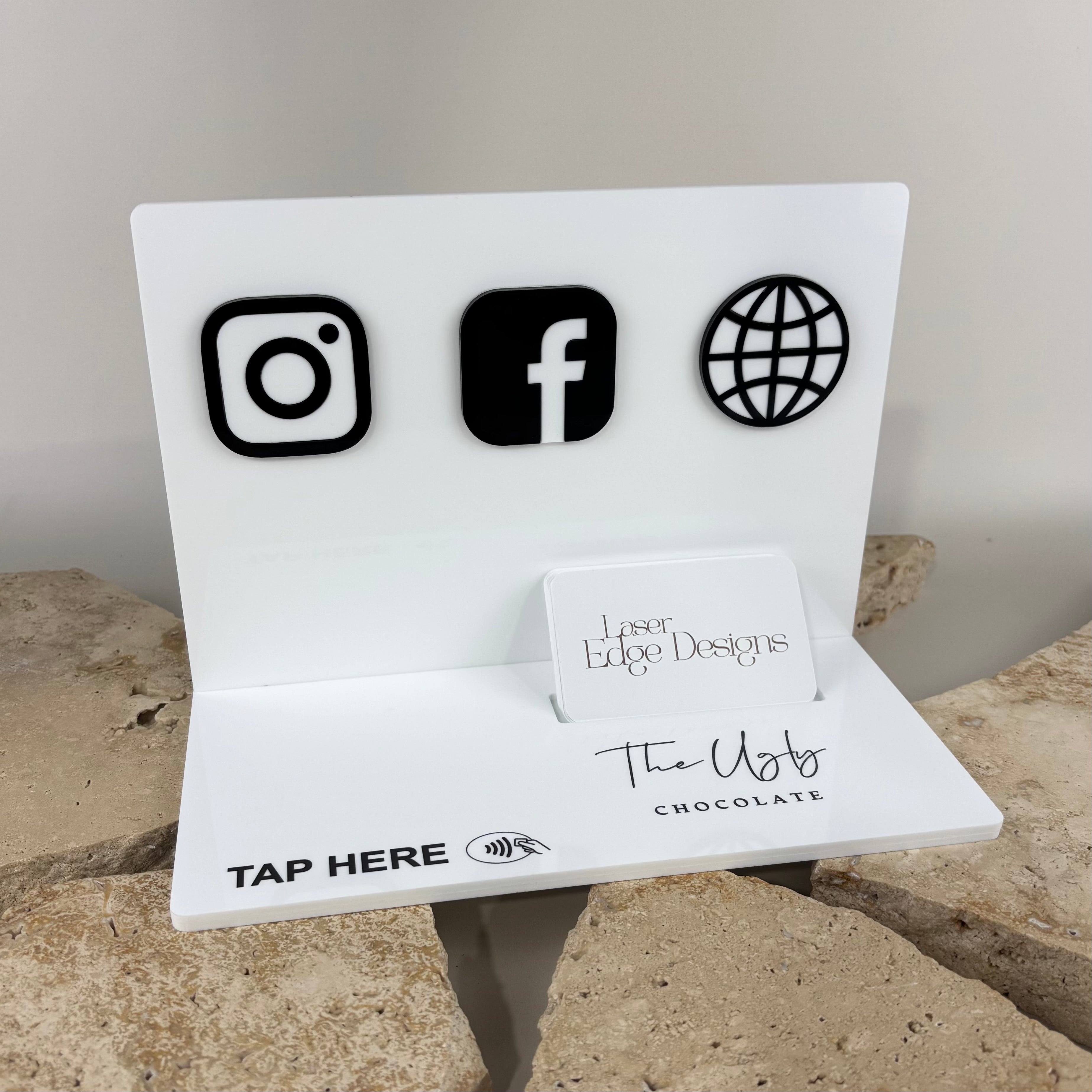 Custom NFC business station display stand with Instagram, Facebook and website icons, acrylic social media sign, branded business card holder and tap-to-connect NFC contactless marketing display for retail stores, salons and small businesses.
