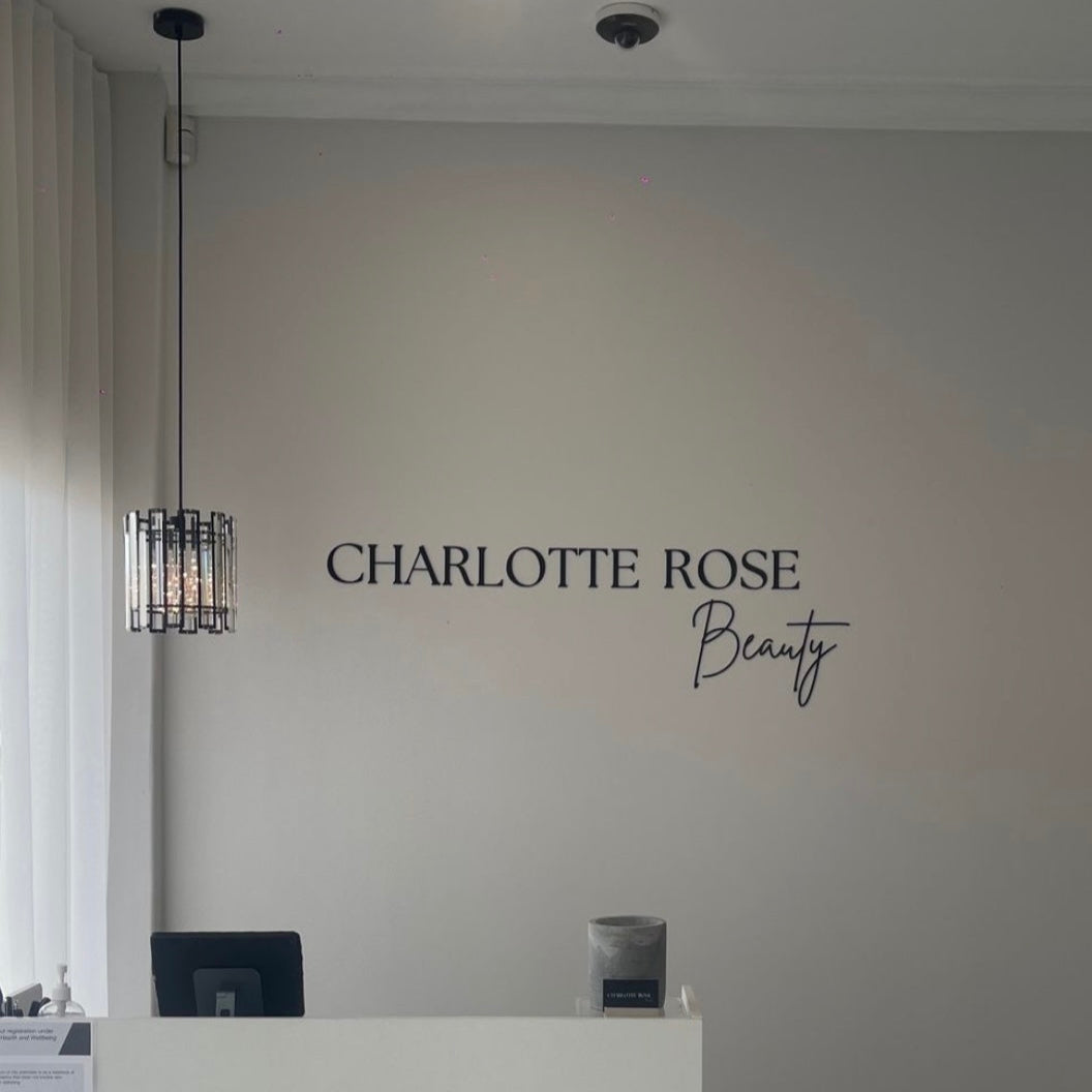 business name sign made from black gloss acrylic letters