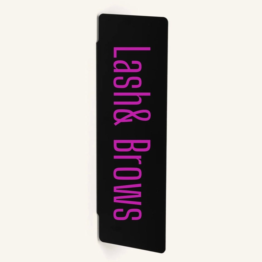 Vertical black rectangular blade sign for lash and brow salon in Australia with pink custom text