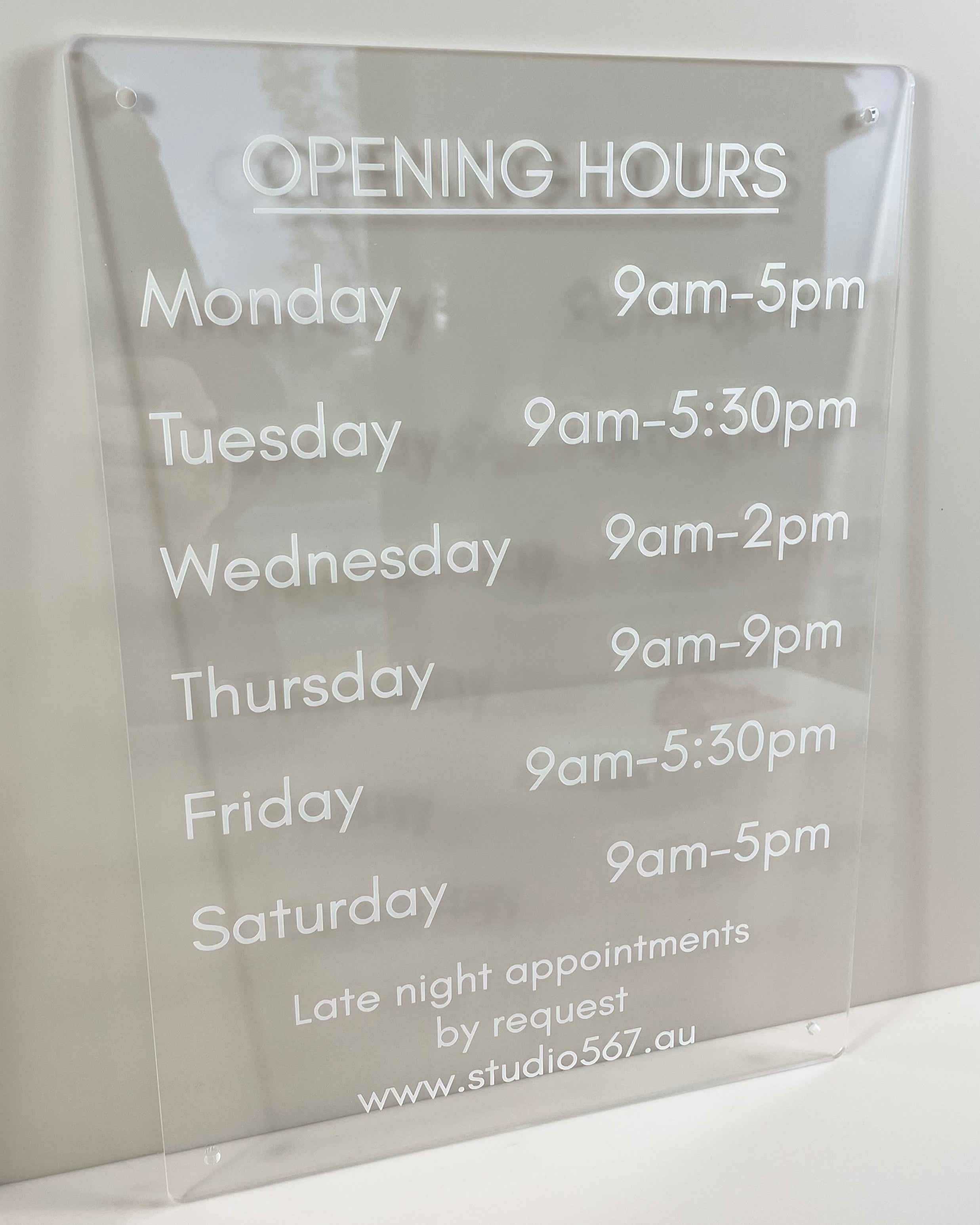 Custom acrylic business hours sign showing weekly trading times – ideal for retail and offices