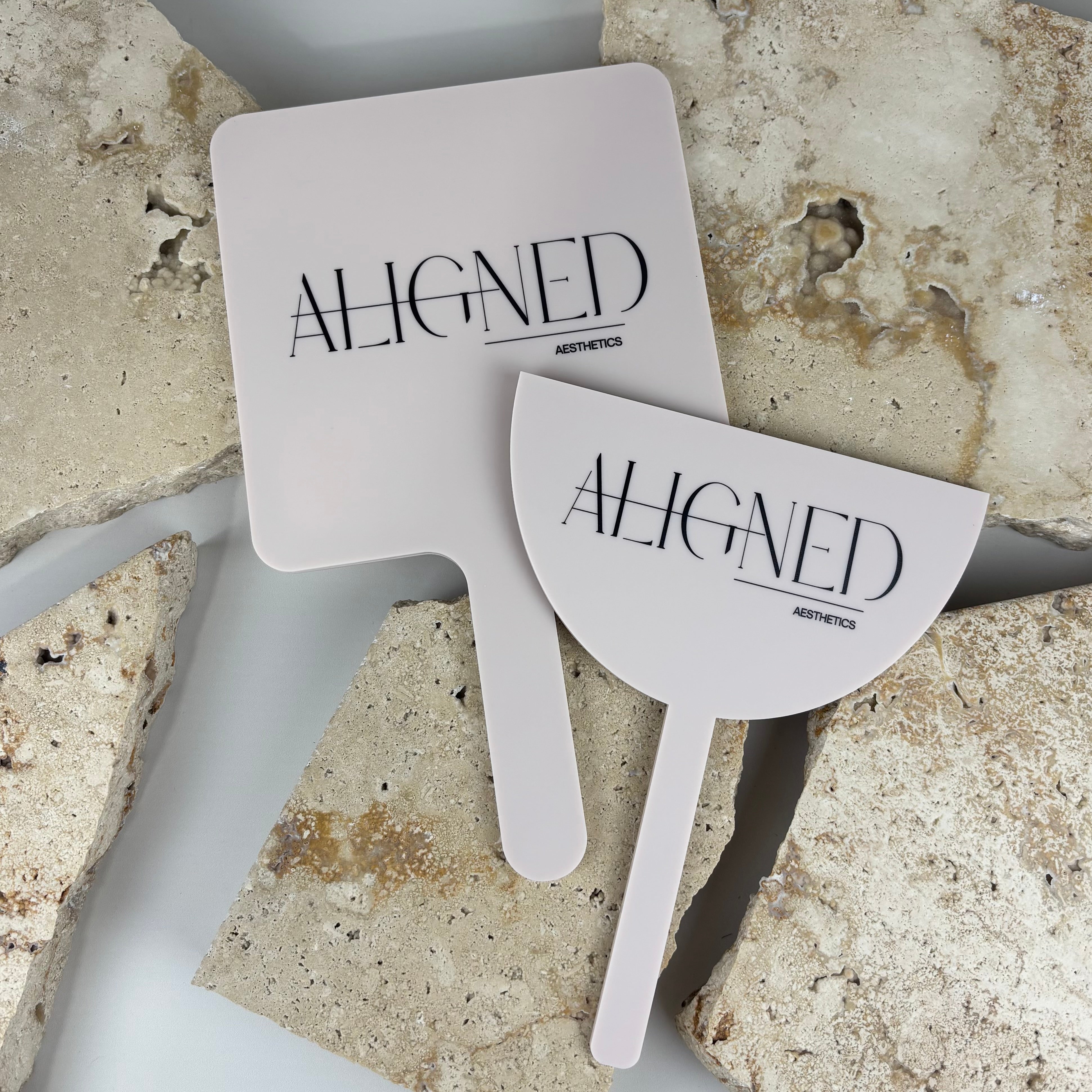 Branded acrylic handheld mirror and shield set with printed logo, custom salon photo props for beauty clinics and aesthetic businesses, lightweight white acrylic paddles perfect for client photos, social media content and professional branding.