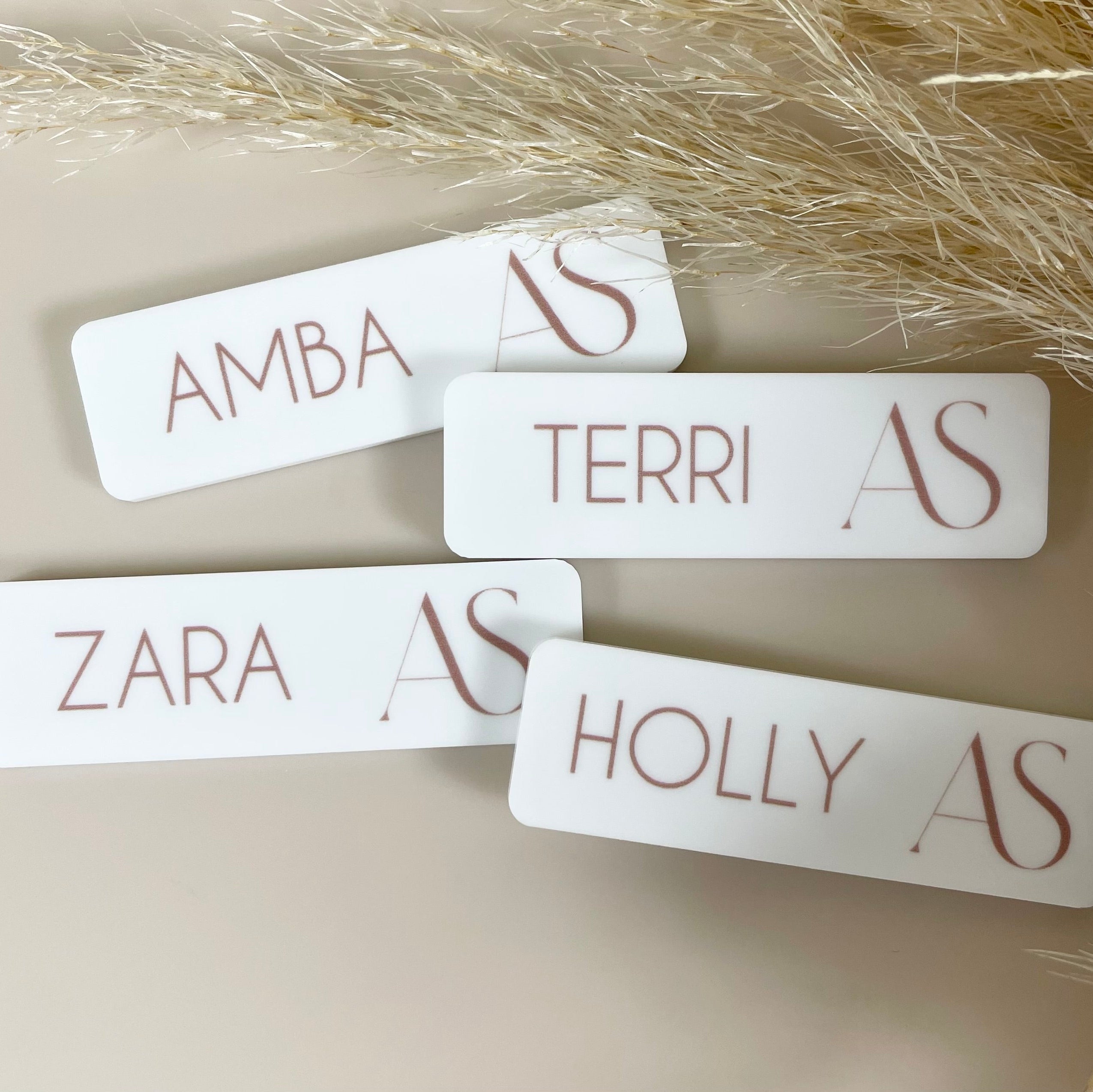 Personalised staff name tags with custom fonts