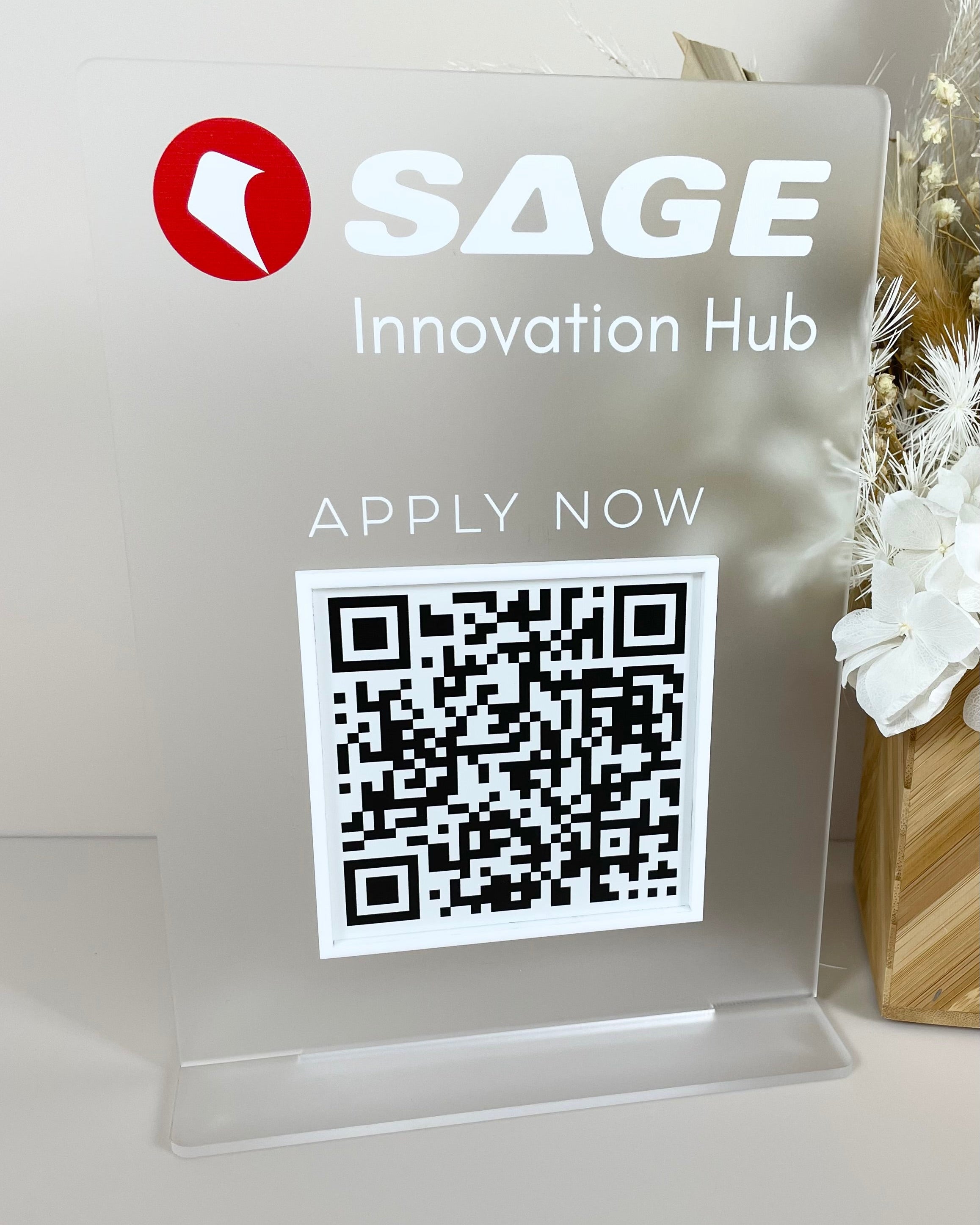 Clear acrylic job application QR sign for SAGE Innovation Hub