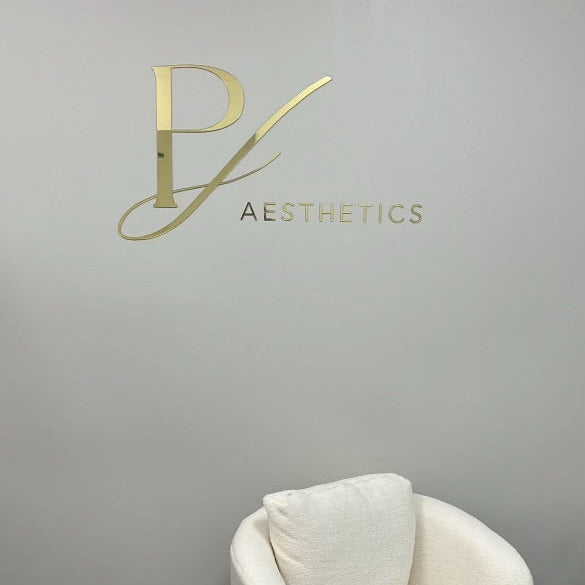 custom acrylic sign with laser cut gold lettering