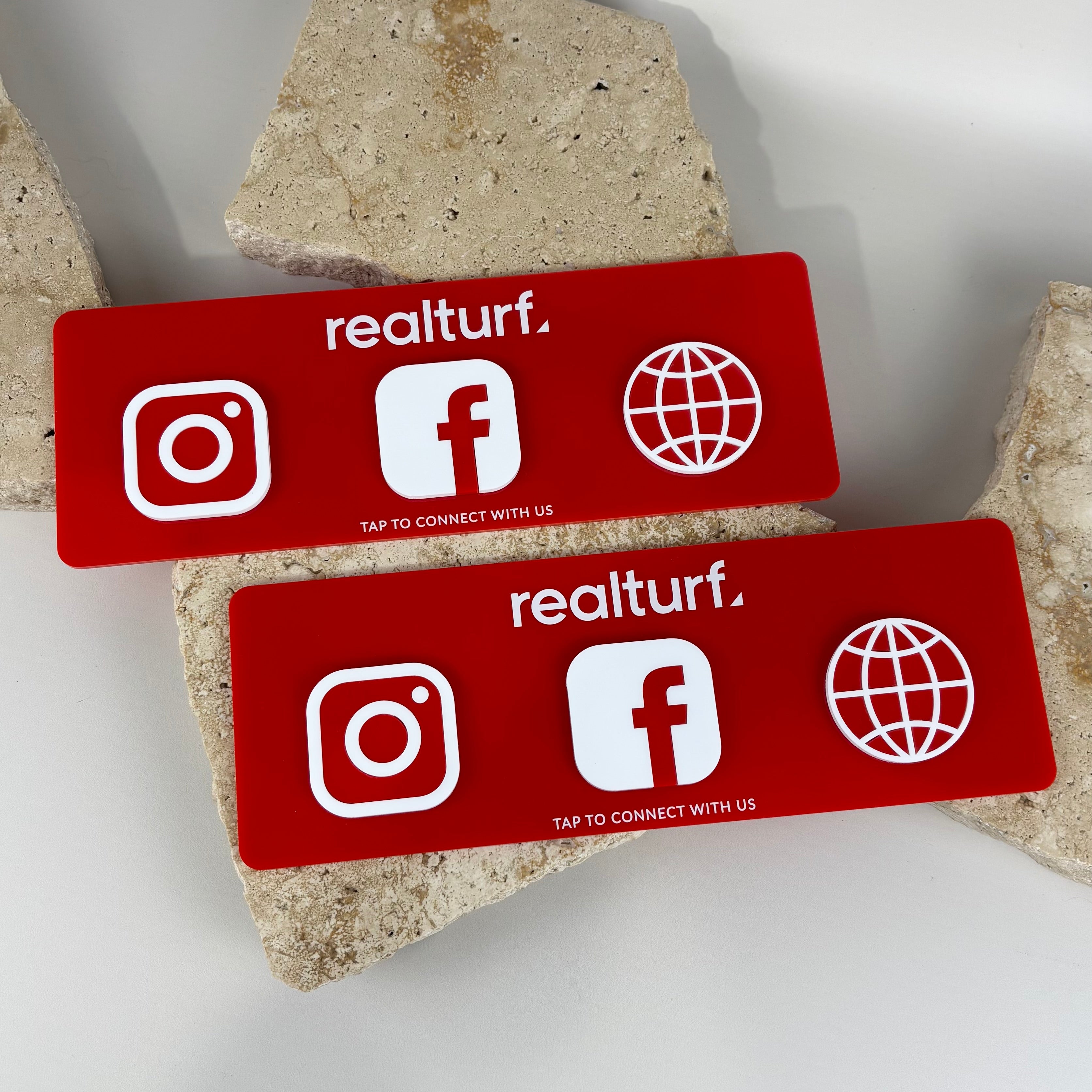 Custom red acrylic NFC social media signs with Instagram, Facebook, and website icons for business branding display