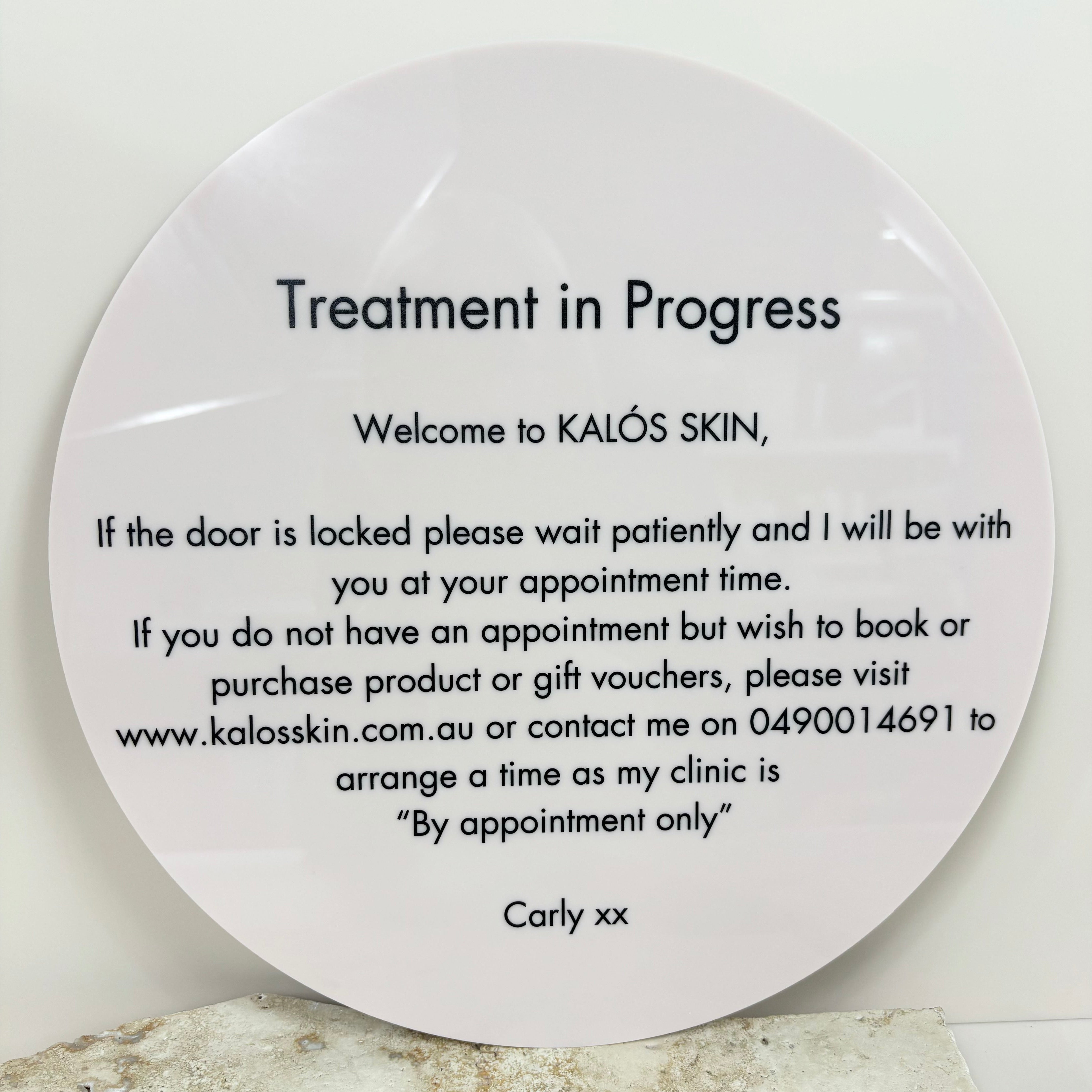 Round latte acrylic treatment in progress sign with minimal design