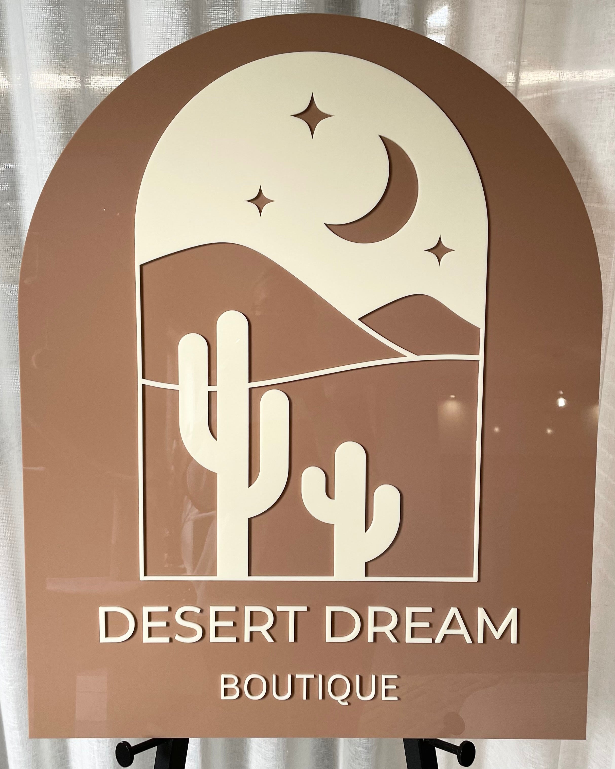 Desert theme arch sign with cacti illustration