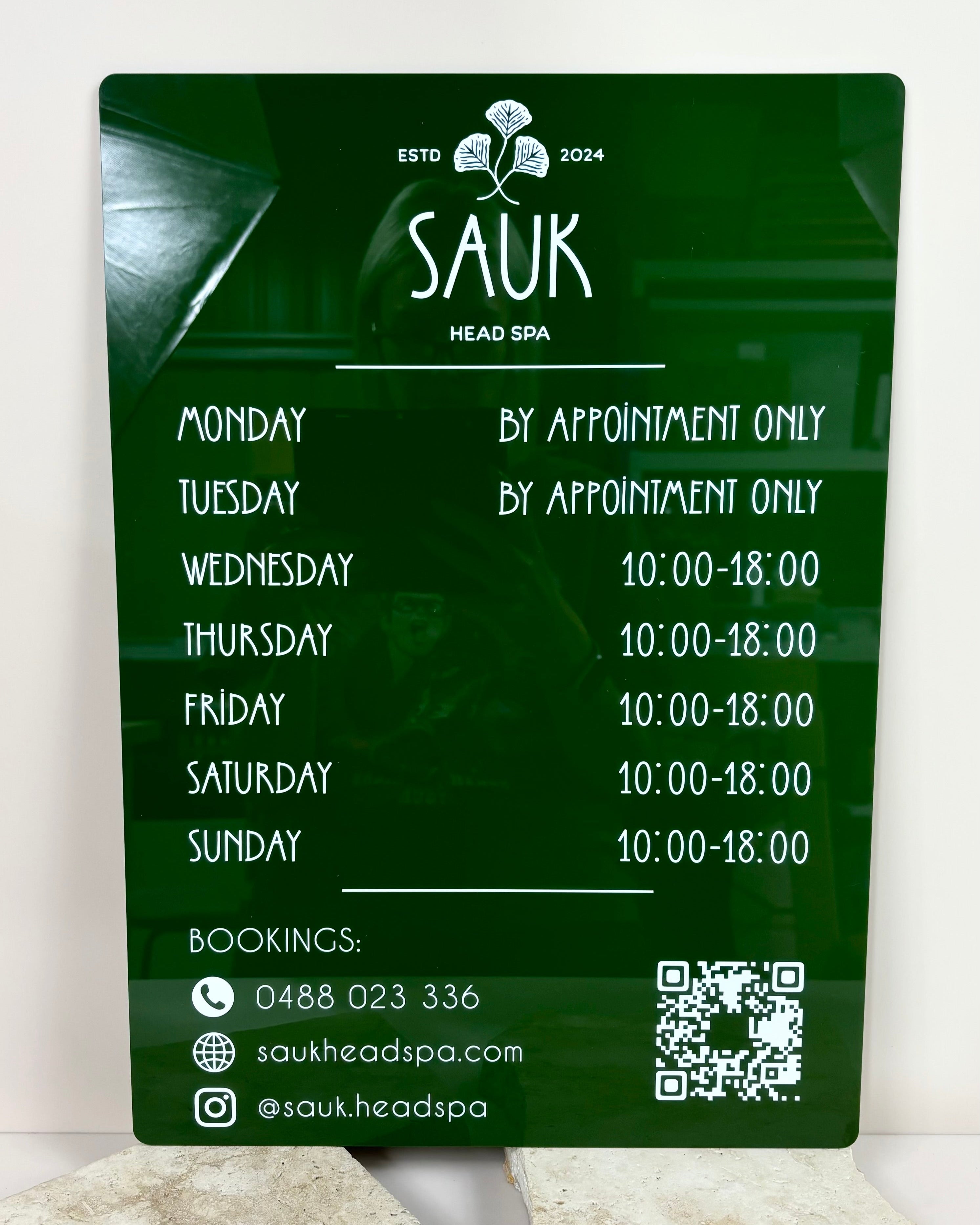 Green acrylic business hours sign, custom shopfront signage with trading times