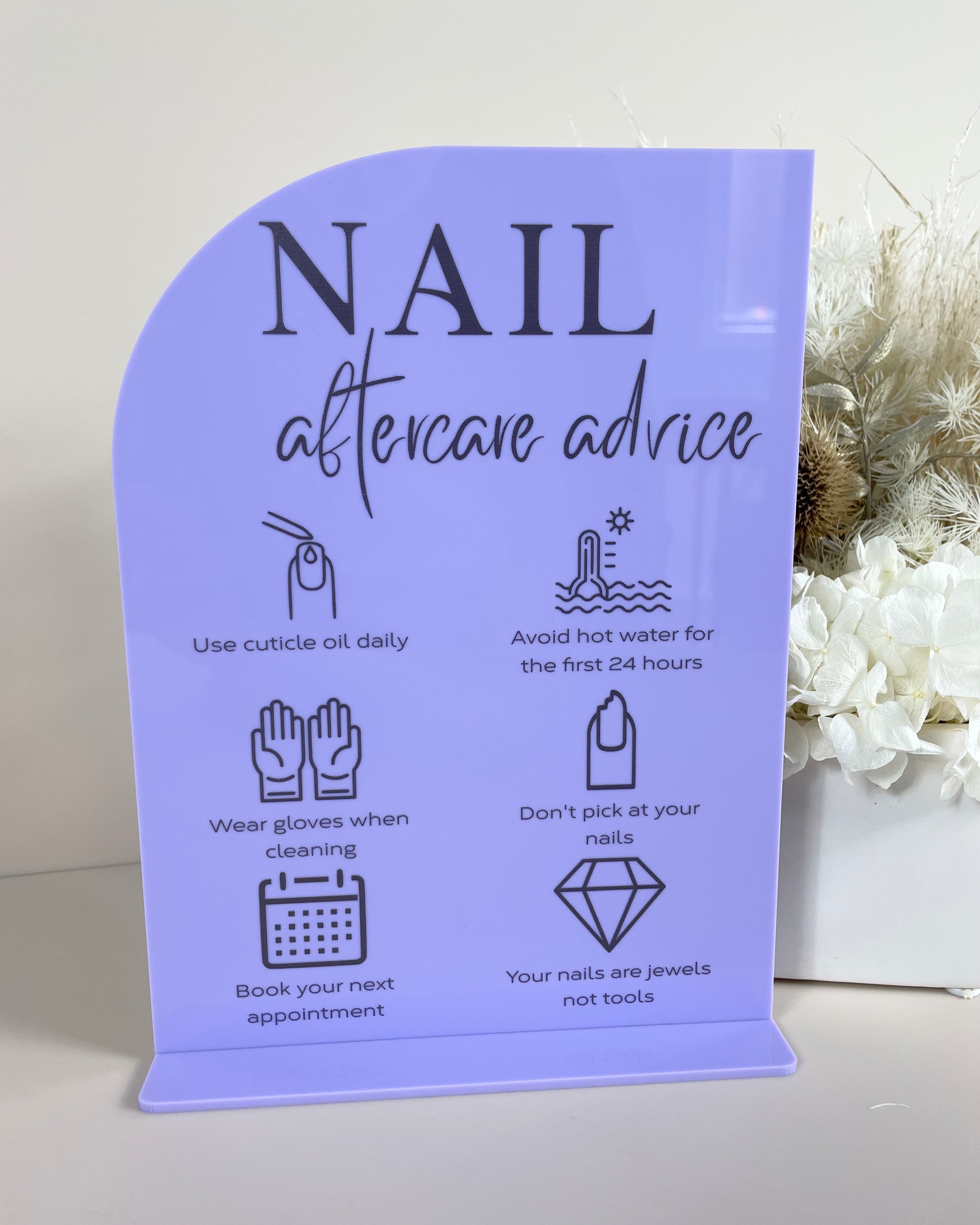 Lavender acrylic nail aftercare advice sign with curved top