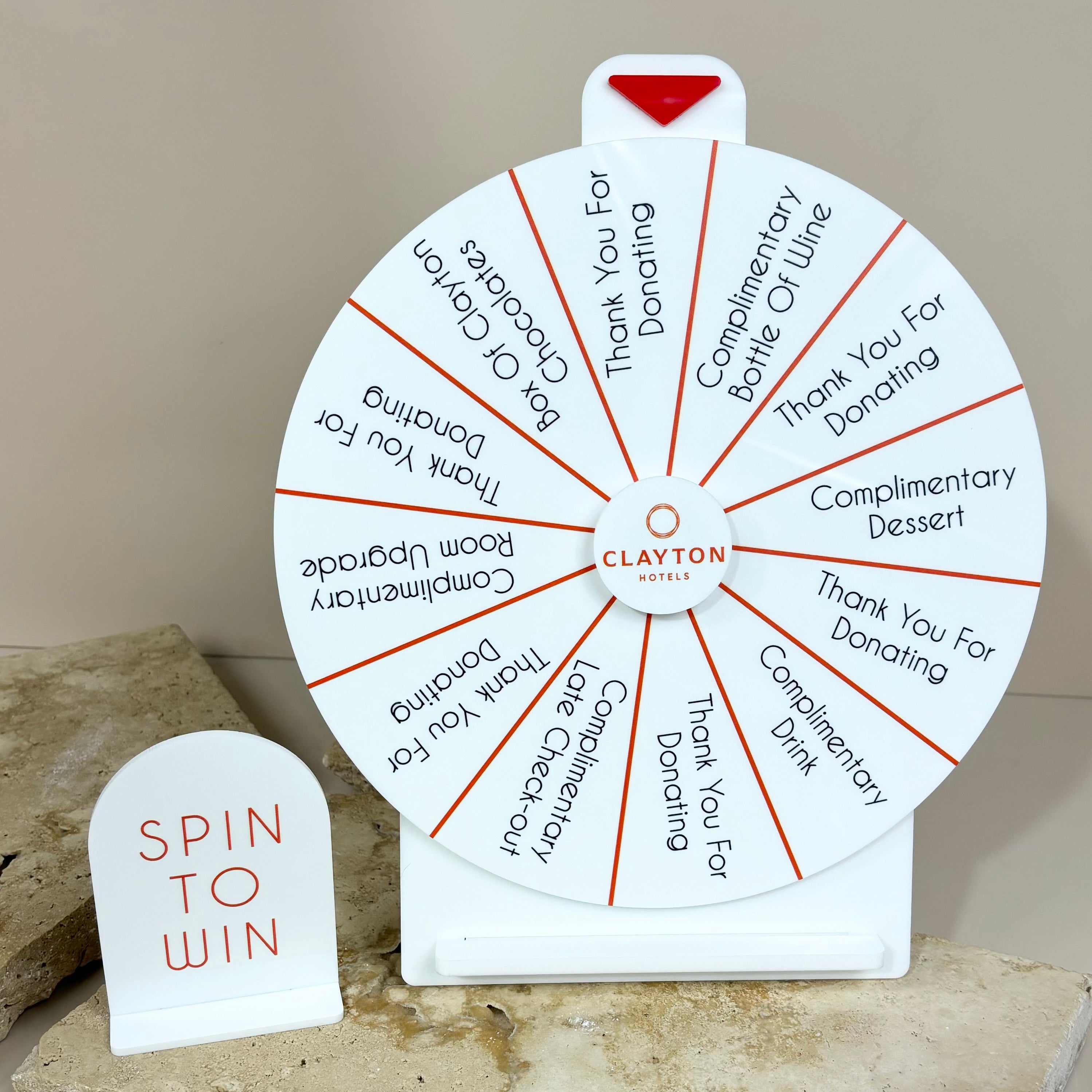White and black spin the wheel with numbered sections for marketing events
