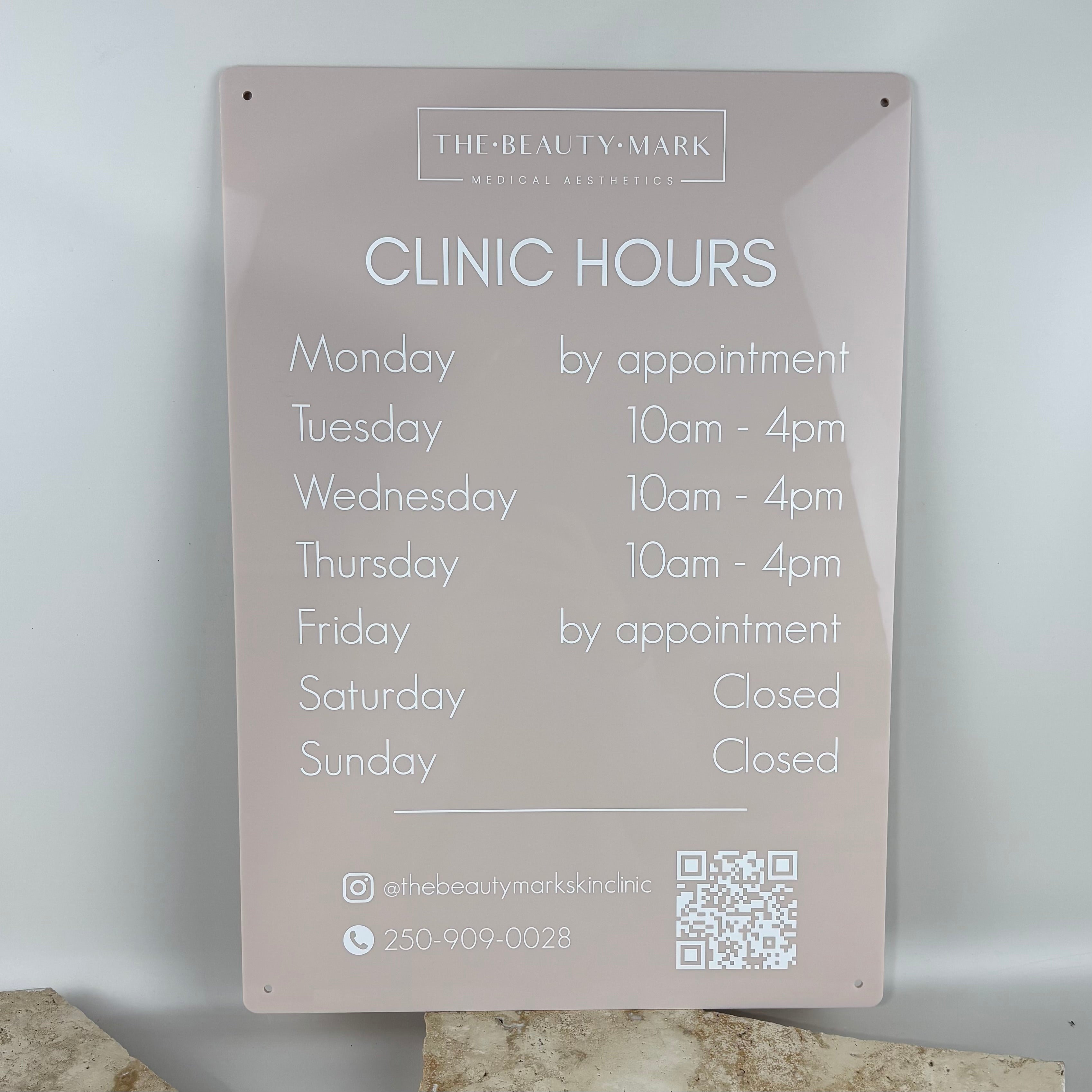 Custom acrylic clinic hours sign in blush pink, UV printed business hours board with white text, medical aesthetics wall signage with QR code, modern reception signage for beauty clinic Australia