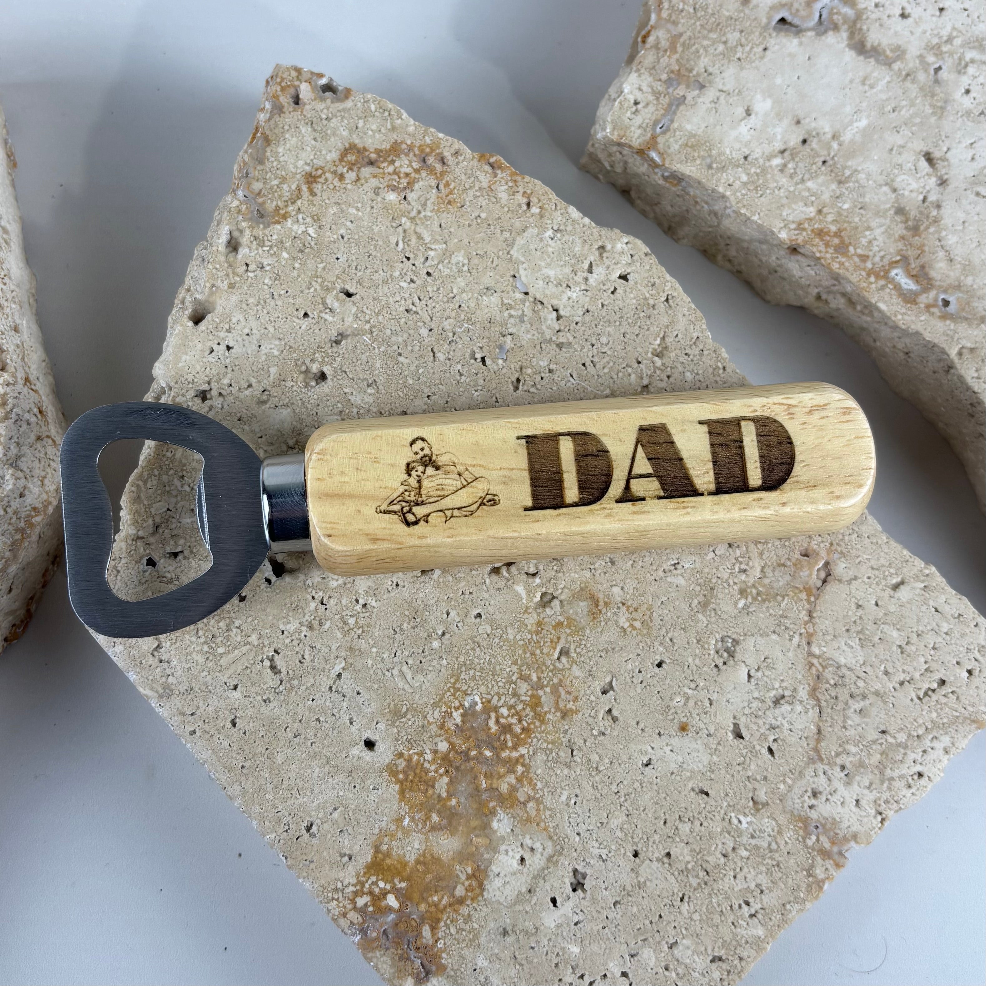 Personalised engraved wooden bottle opener with a stainless steel opener and custom laser engraved “Dad” design. Premium timber bottle opener, perfect as a Father’s Day gift, birthday present, Christmas gift, groomsmen gift, corporate gift or personalised keepsake for beer lovers.