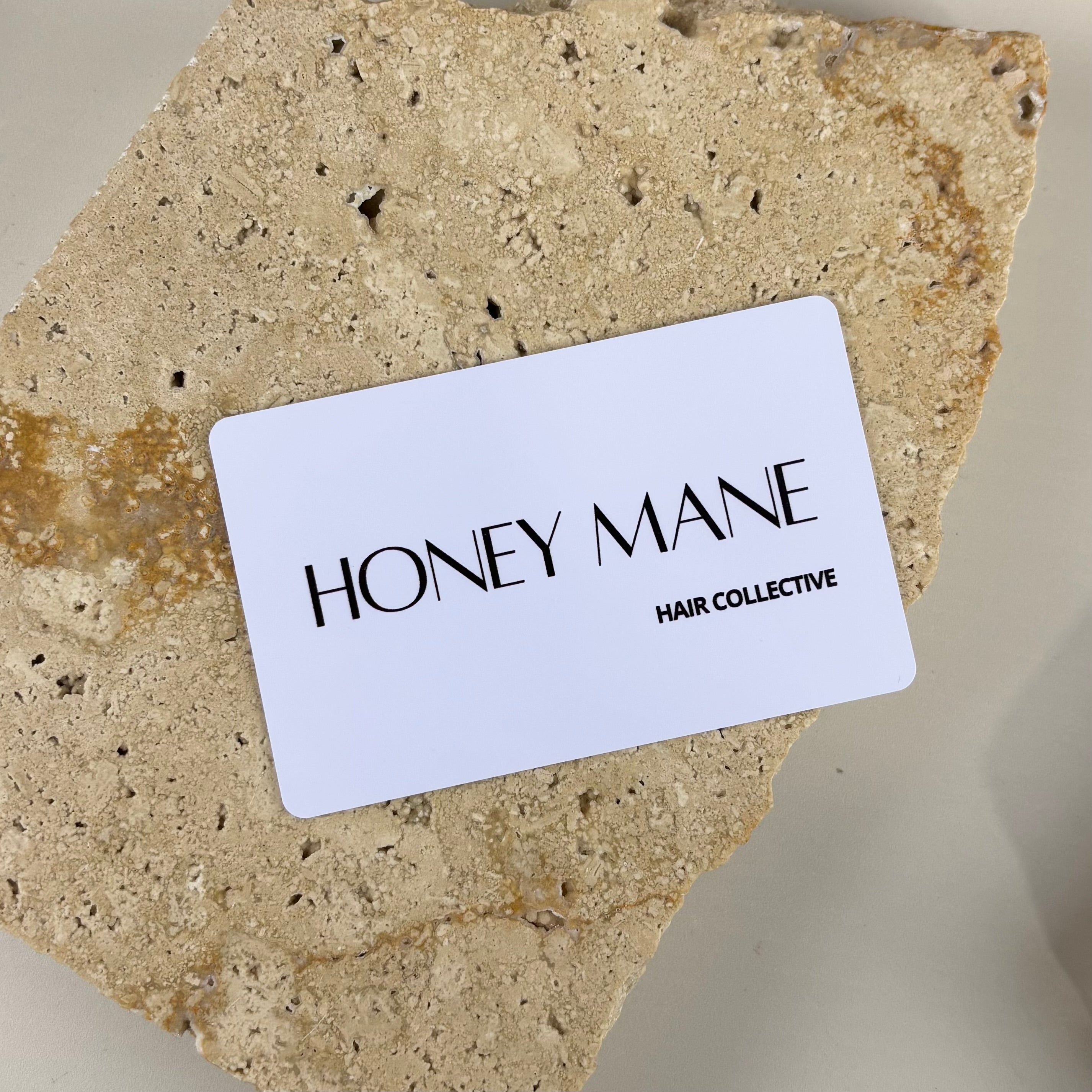 Custom NFC business card with minimalist logo design on white card, tap-to-share digital business card ideal for salons, small businesses and professionals replacing traditional business cards.