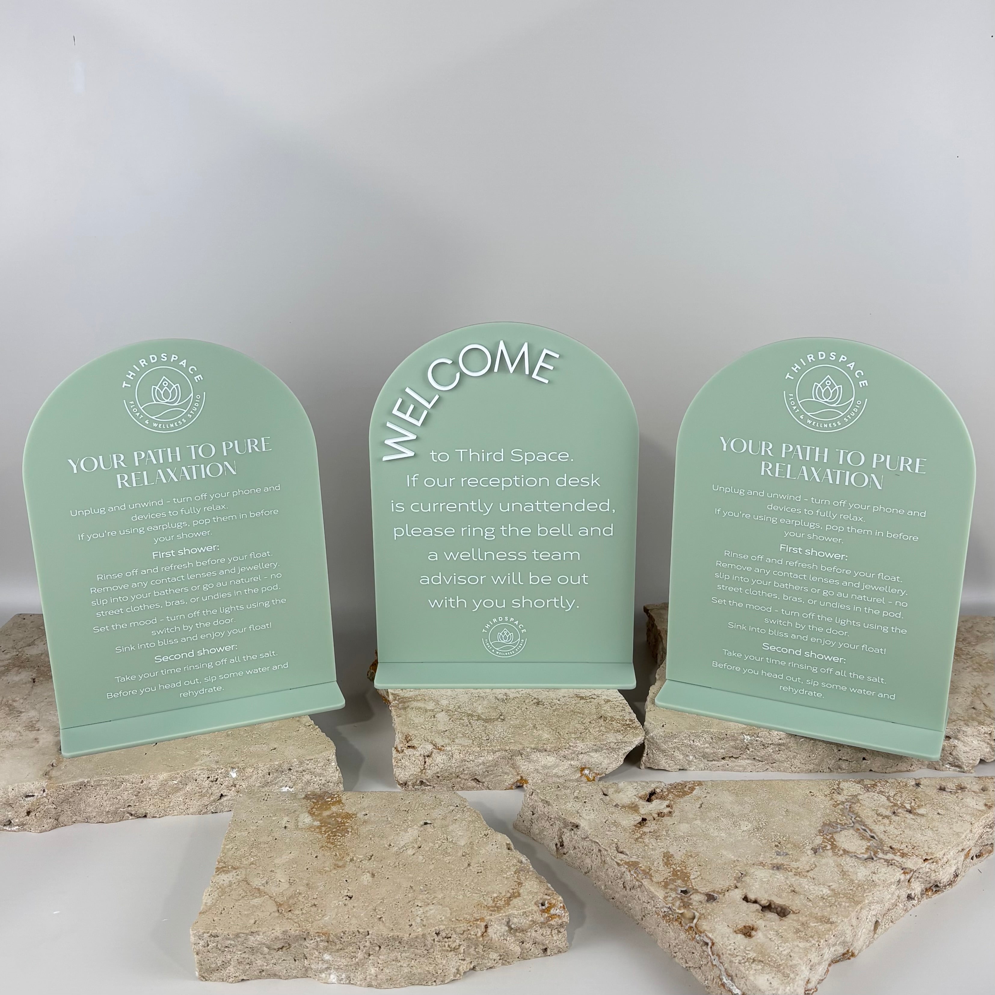 Custom arch acrylic display stands for reception counter with UV printed welcome and instruction signage